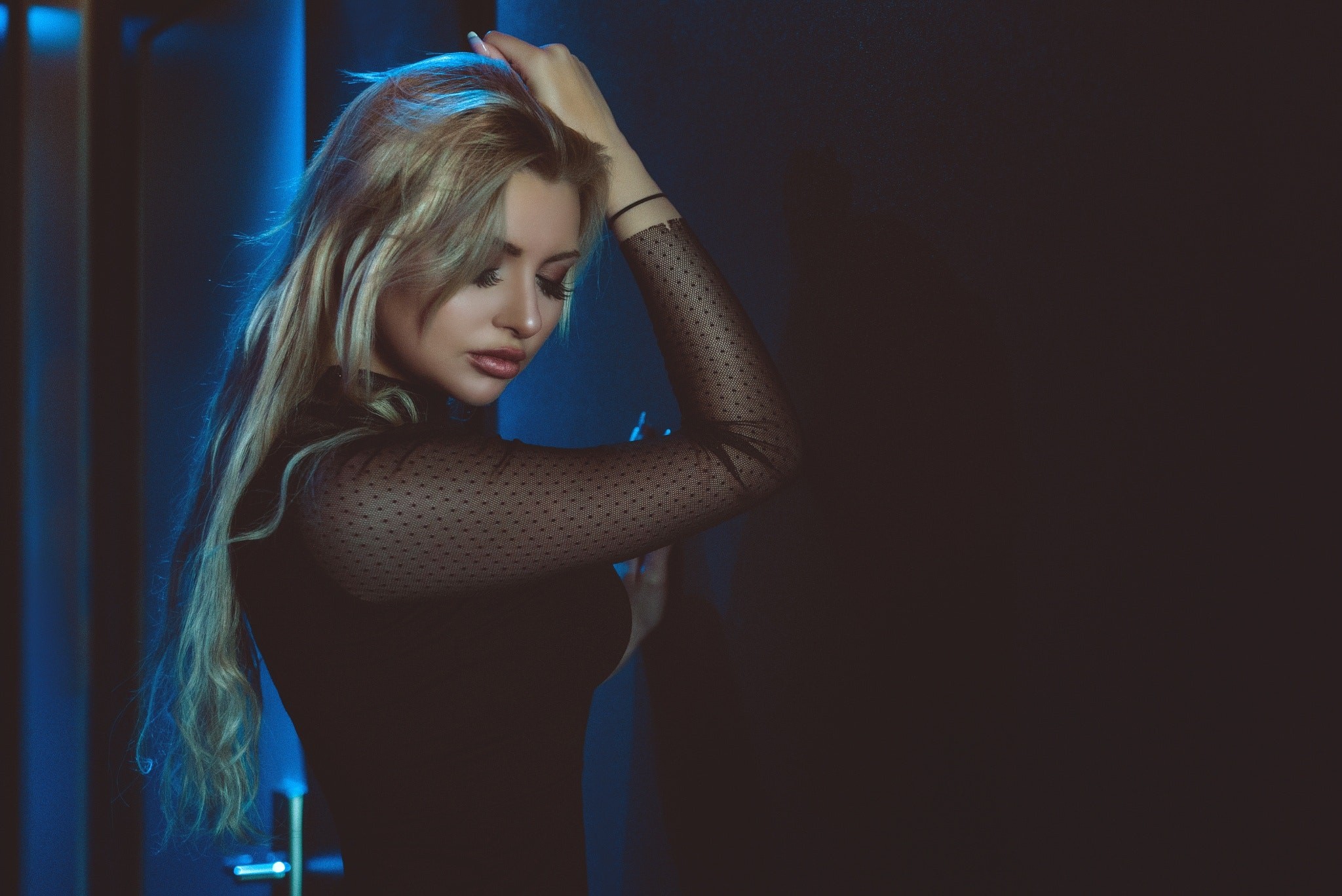 Woman with blonde hair in black top HD Wallpaper