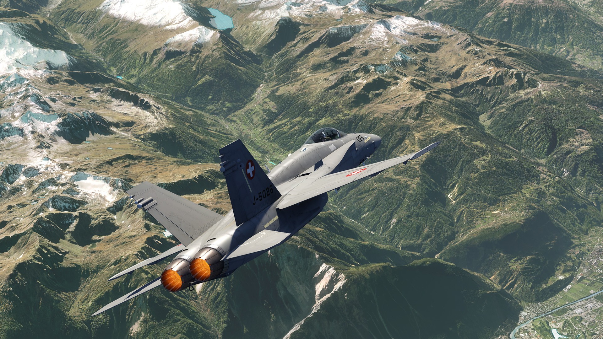 Swiss Air Force FA-18 Hornet flying over mountains HD Wallpaper