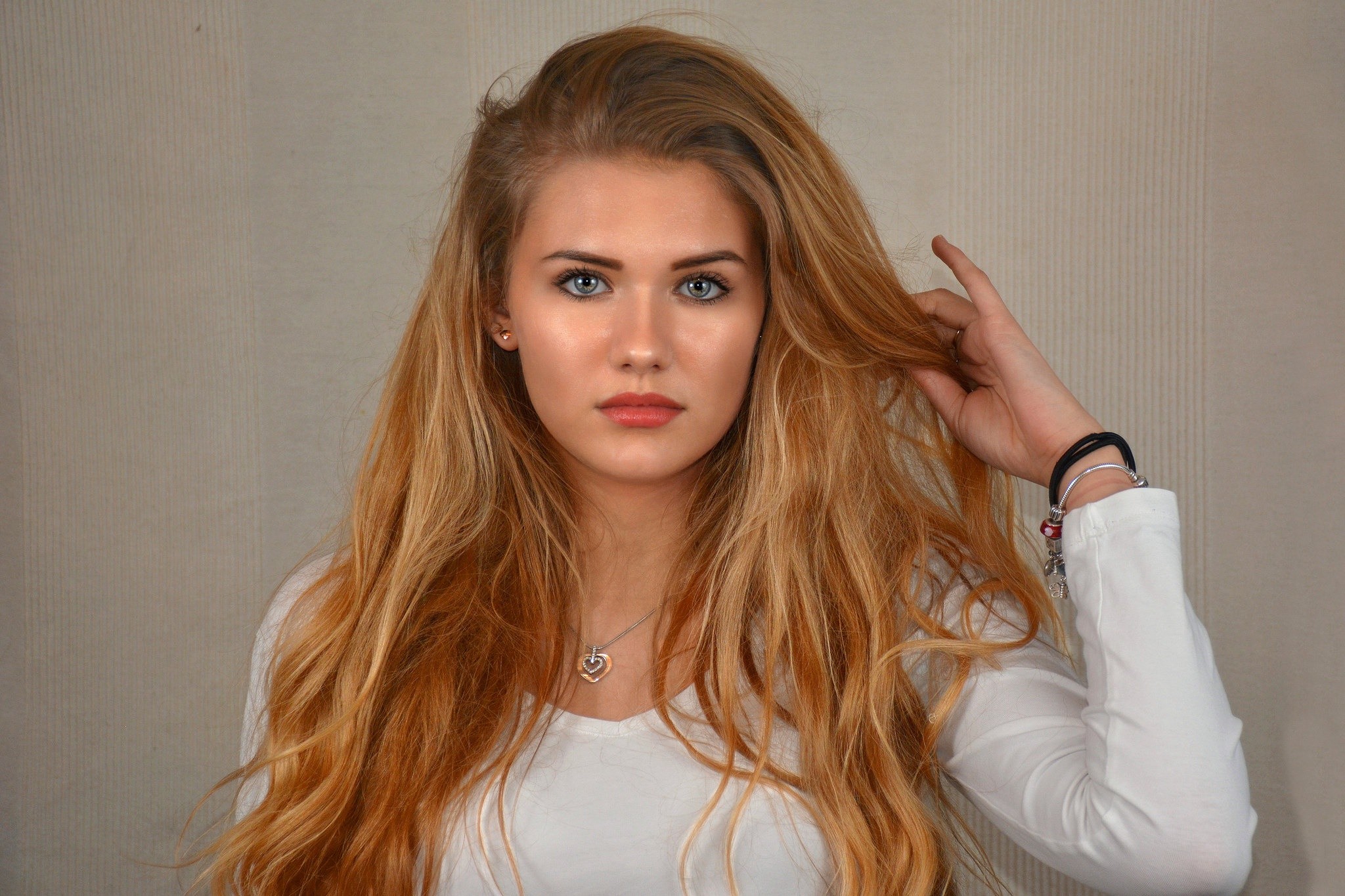 Portrait of a young woman with long blonde hair HD Wallpaper