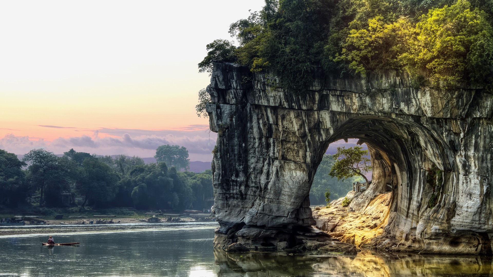 Rock arch over a river in China at sunset HD Wallpaper
