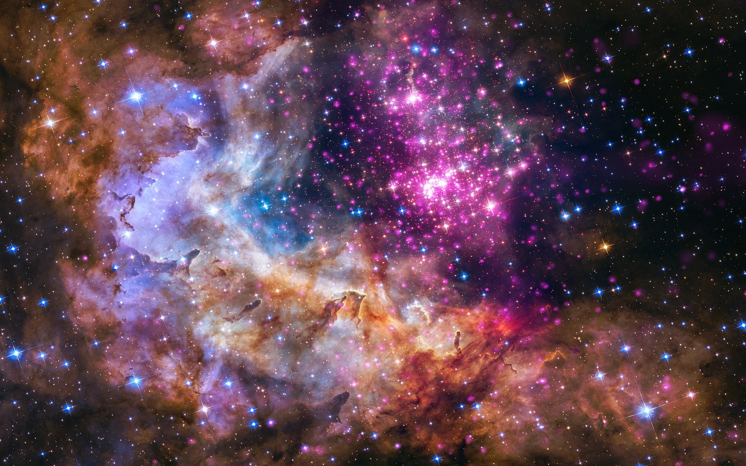 Star cluster in a colorful nebula HD Wallpaper