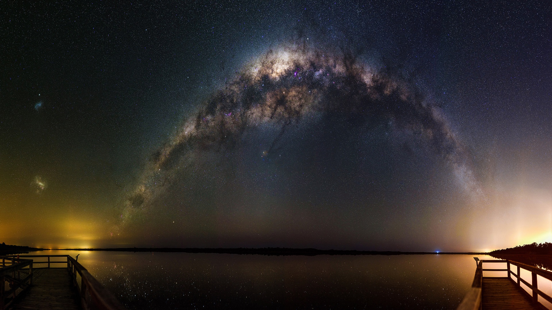 Milky Way over a lake with wooden piers HD Wallpaper