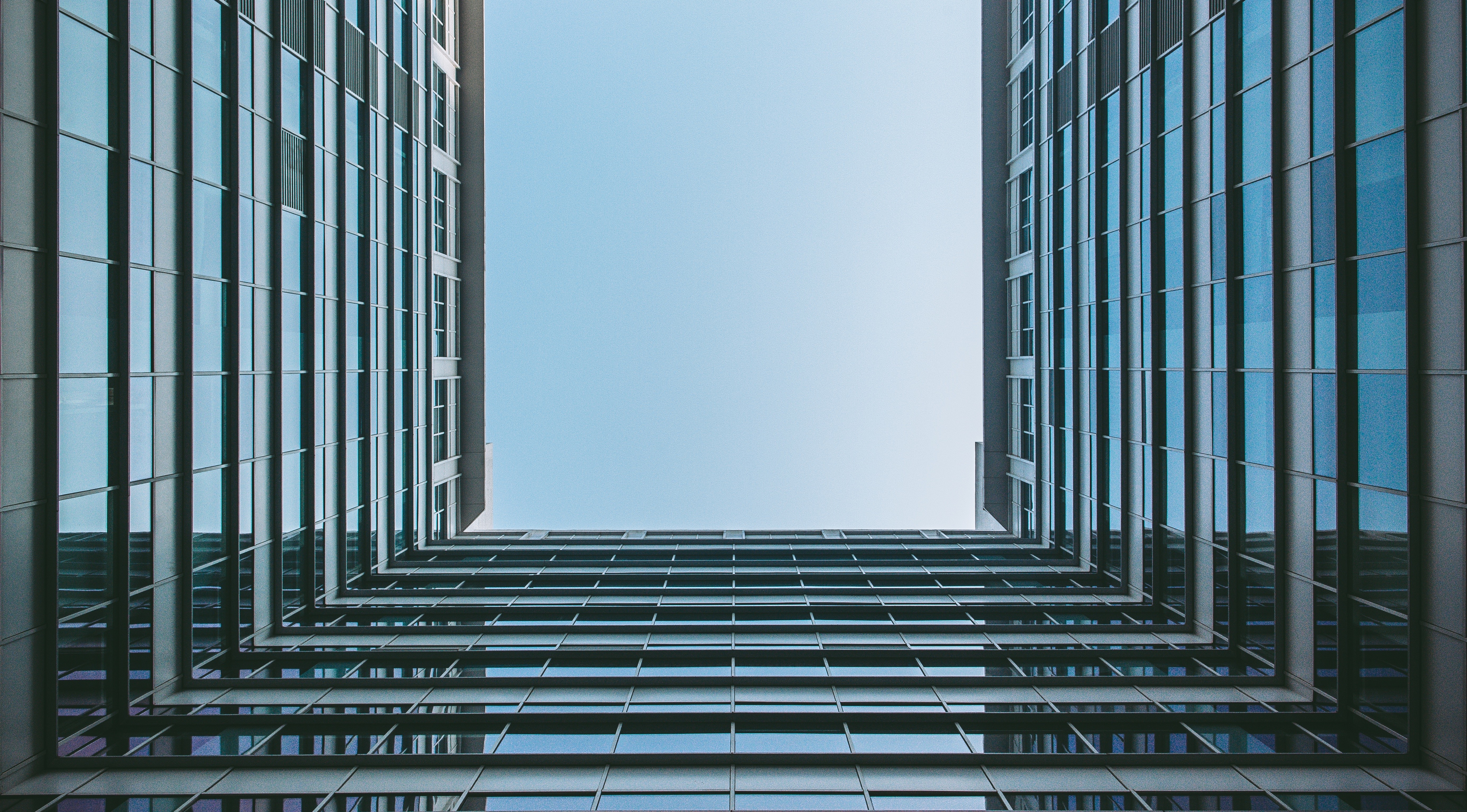 Modern building with a clear sky view HD Wallpaper