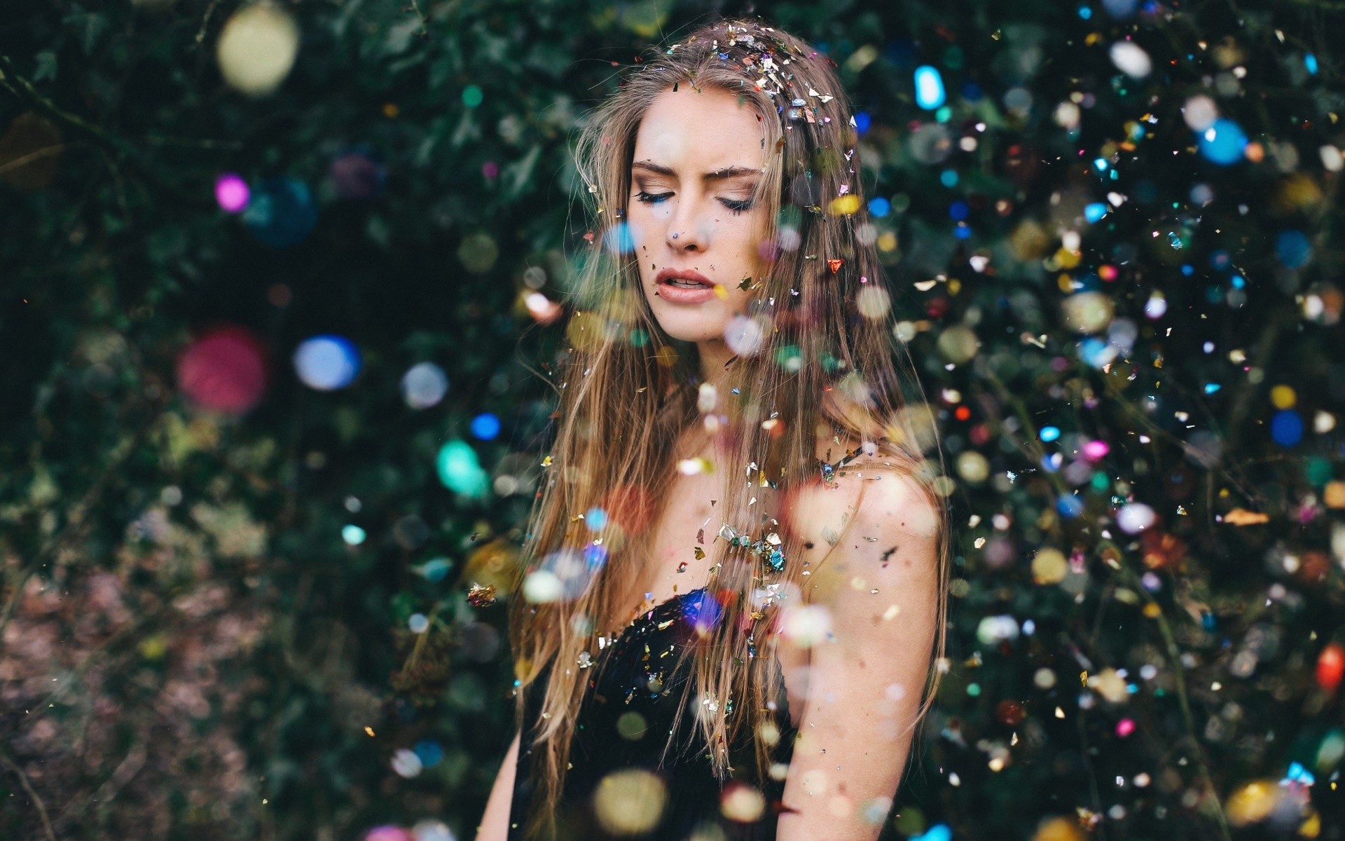 Woman with confetti and bokeh lights HD Wallpaper