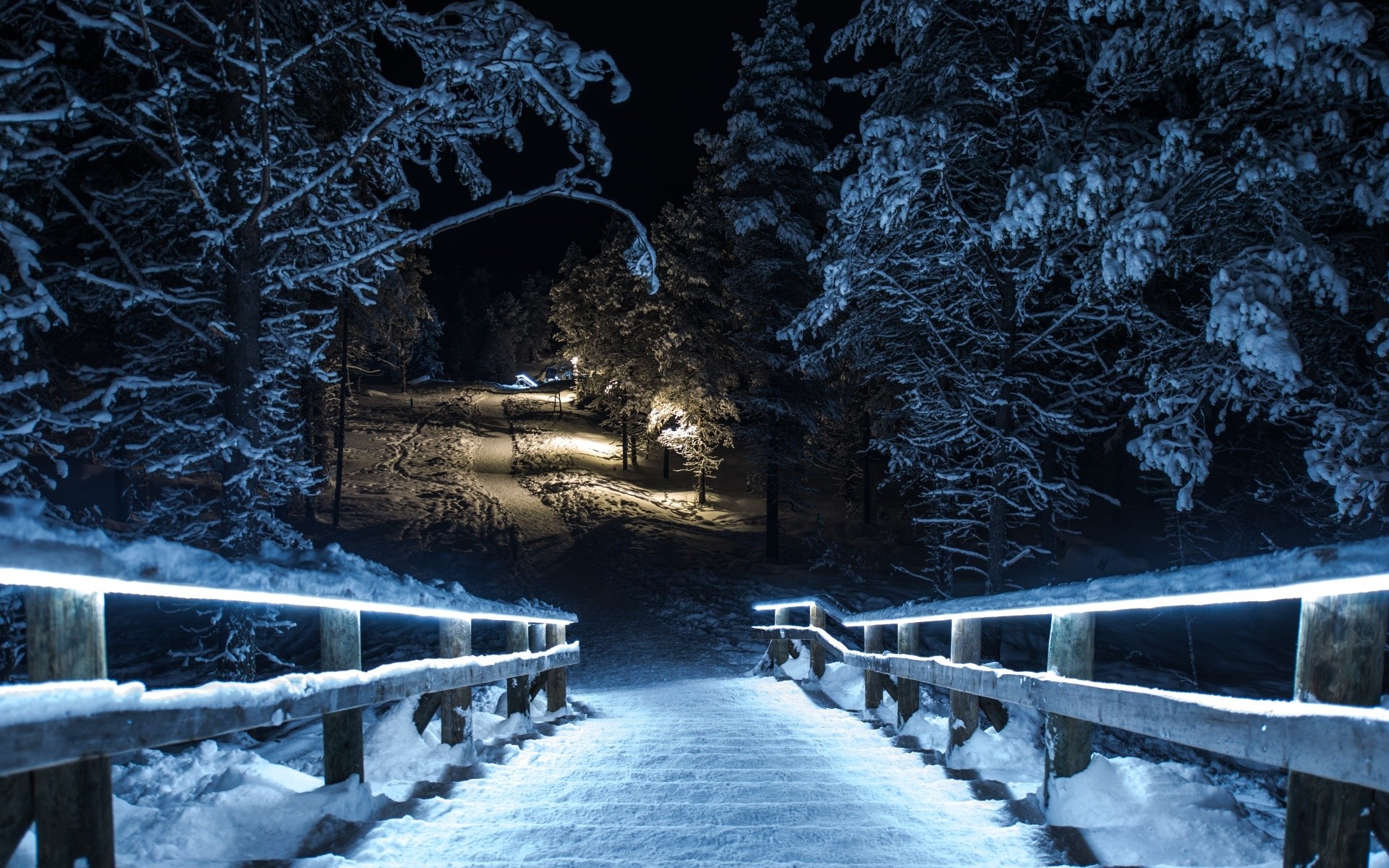 Snowy wooden stairs at night with lights HD Wallpaper