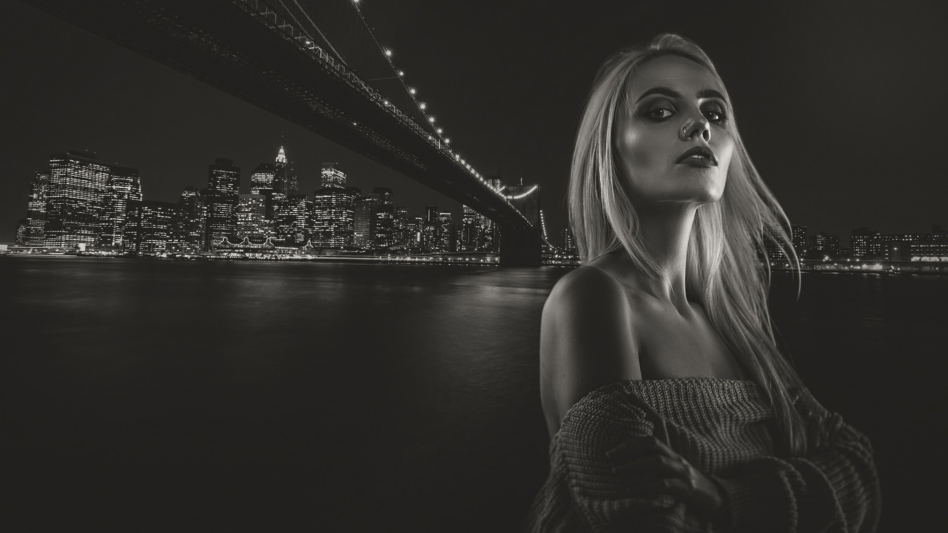 Woman posing in front of Brooklyn Bridge at night HD Wallpaper