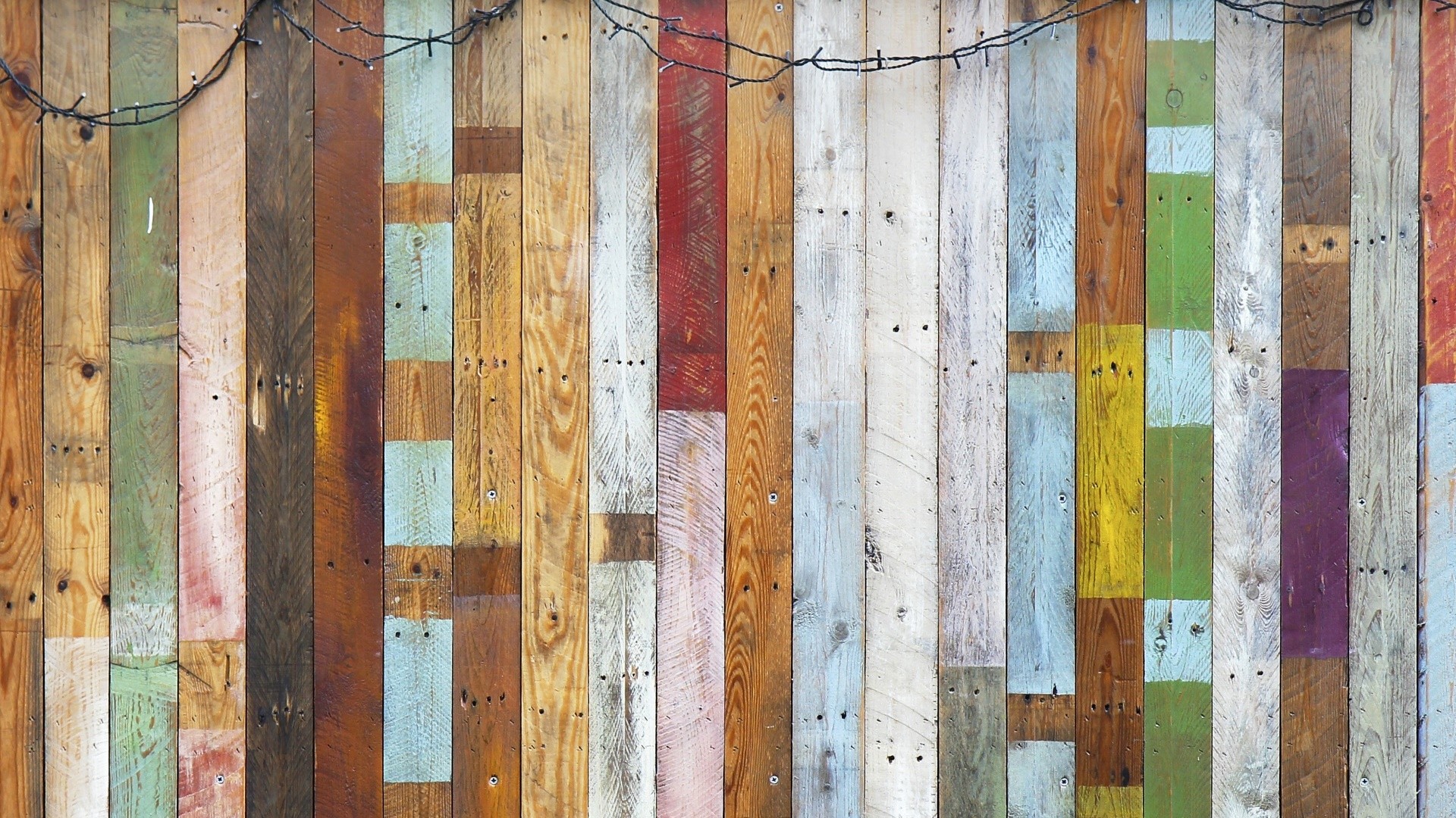 Colorful wooden planks with string lights HD Wallpaper