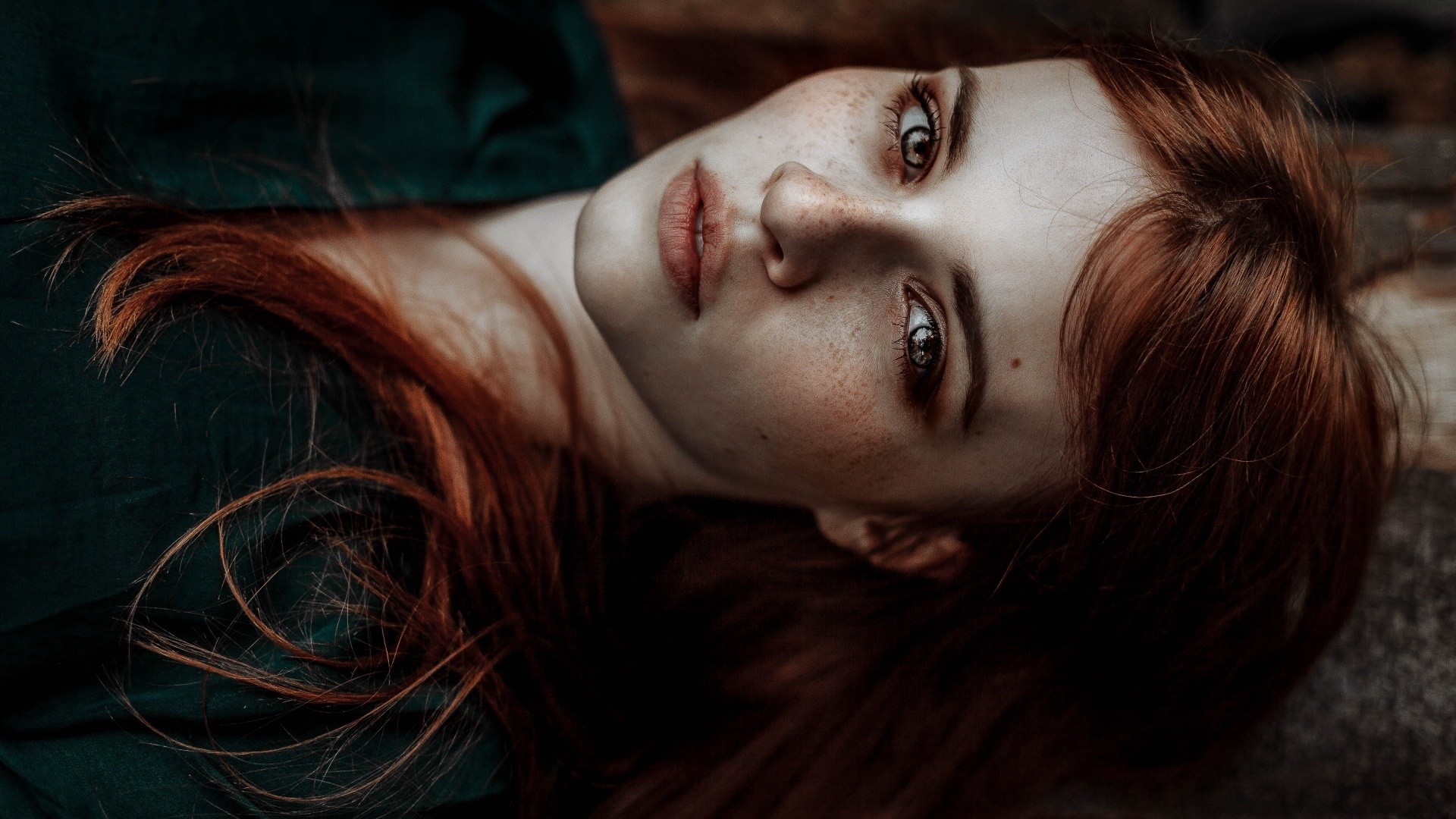 Portrait of a young woman with red hair and freckles HD Wallpaper