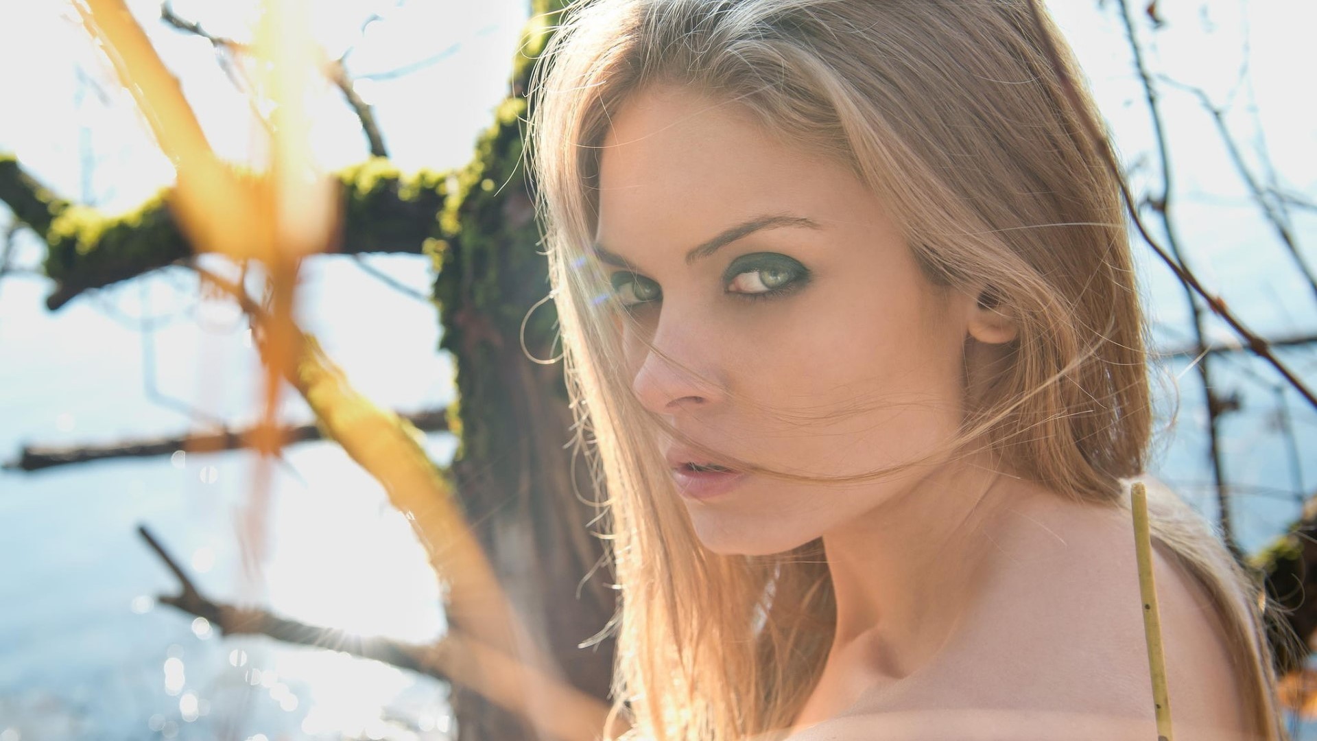 Woman with green eyes outdoors HD Wallpaper