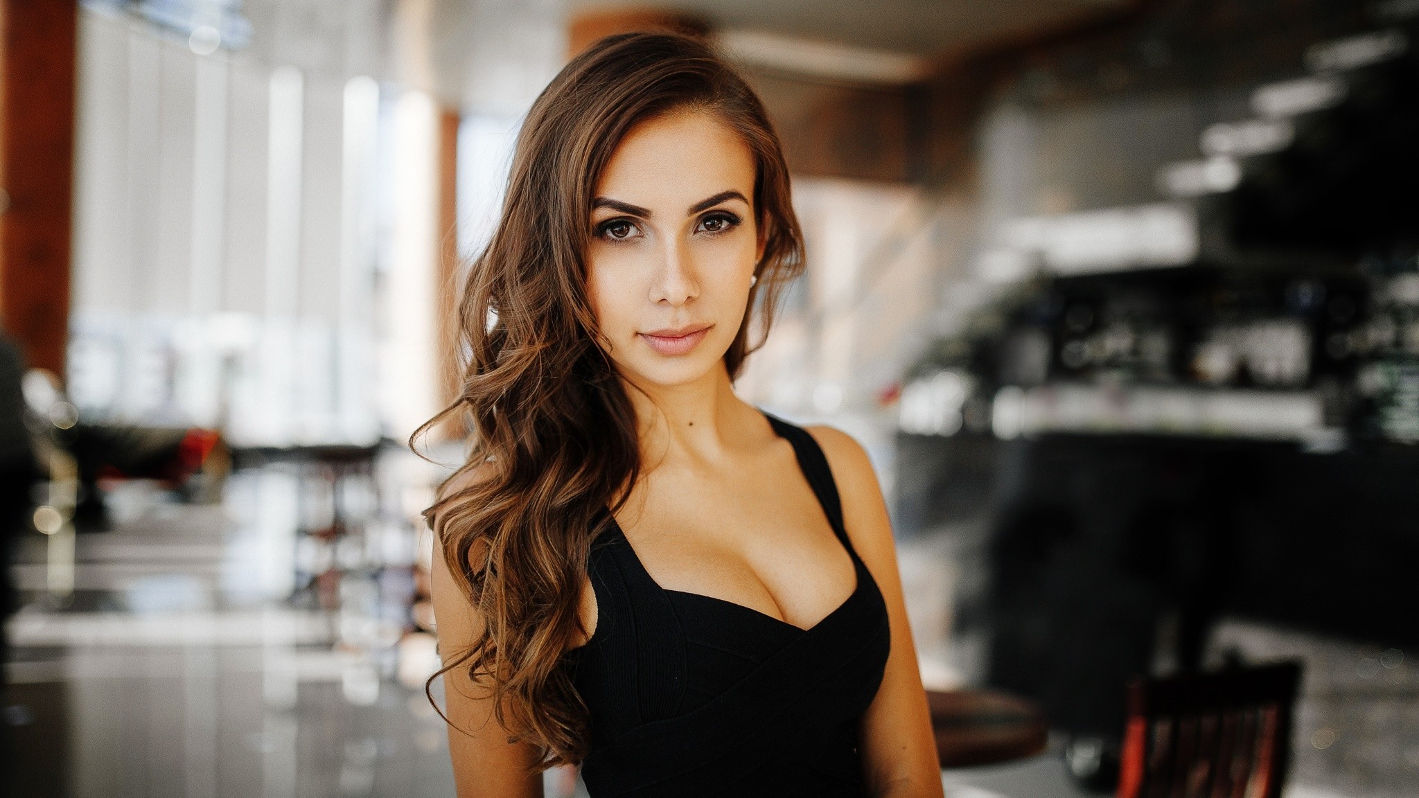Woman in black dress with wavy hair HD Wallpaper