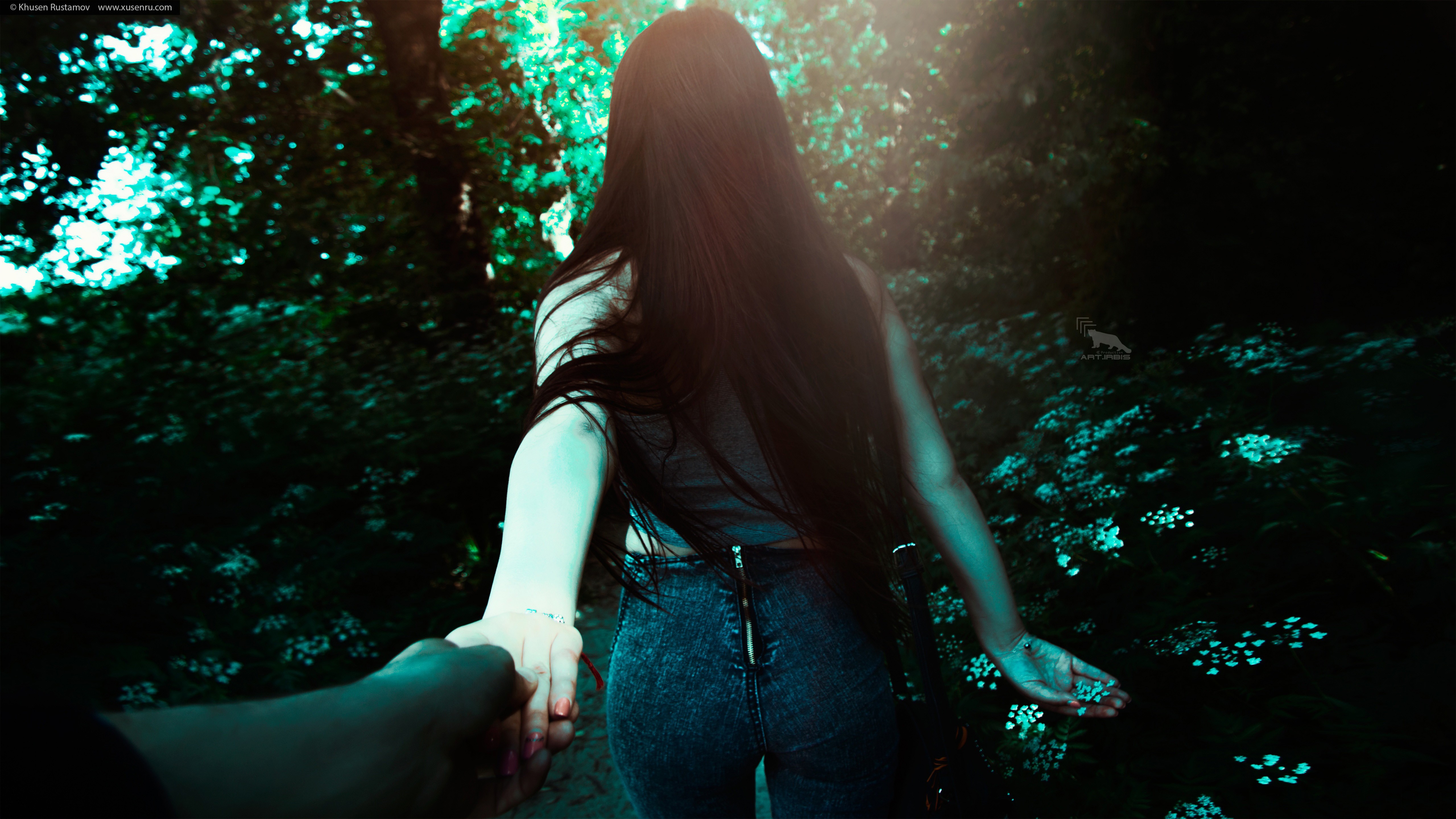 Woman with long dark hair in skinny jeans HD Wallpaper