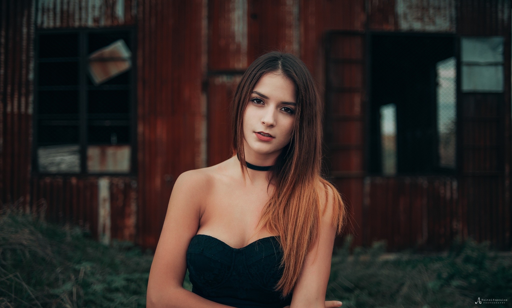 Woman with choker in front of abandoned building HD Wallpaper