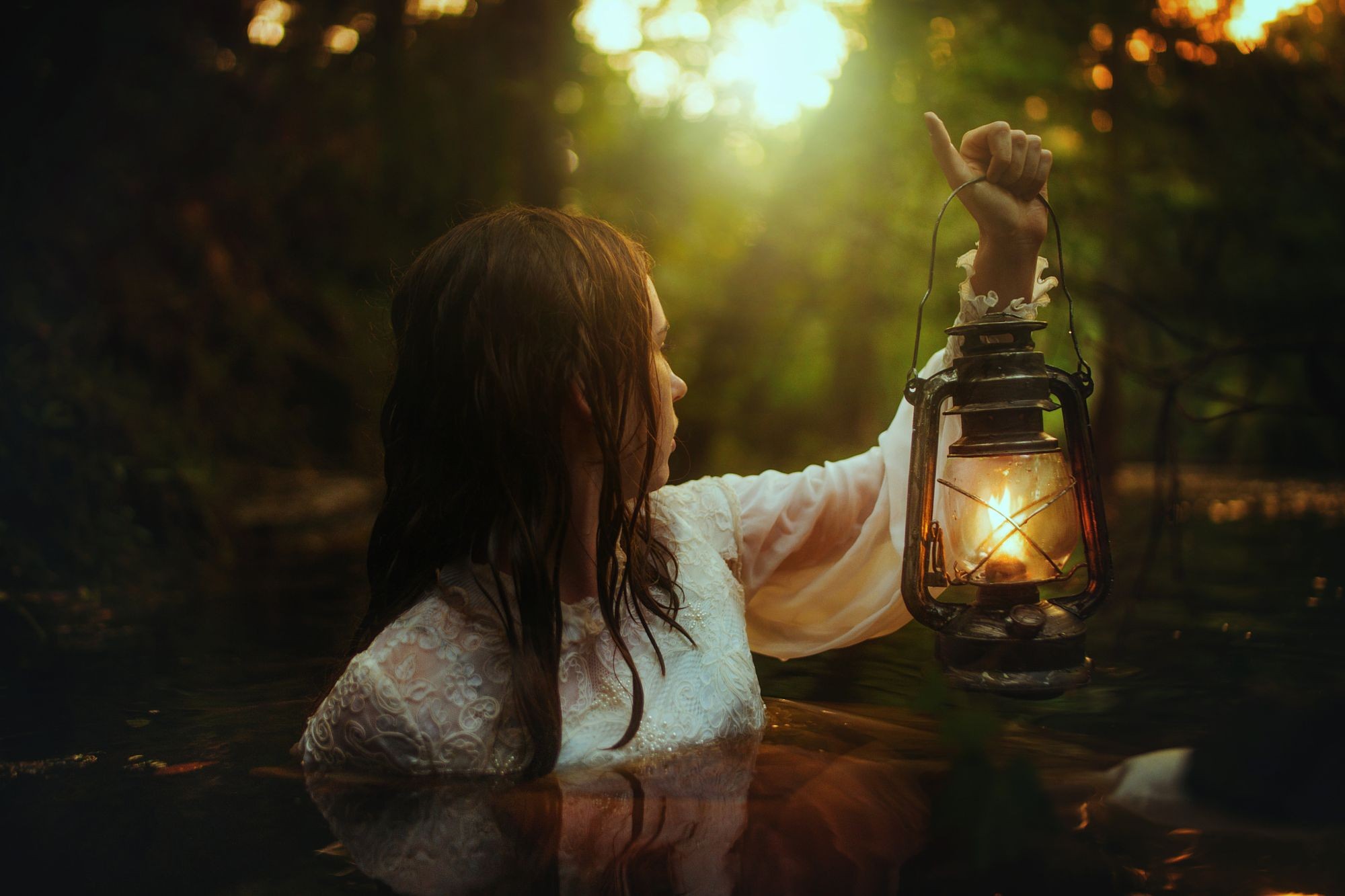 Woman in white dress holding a lantern in water HD Wallpaper