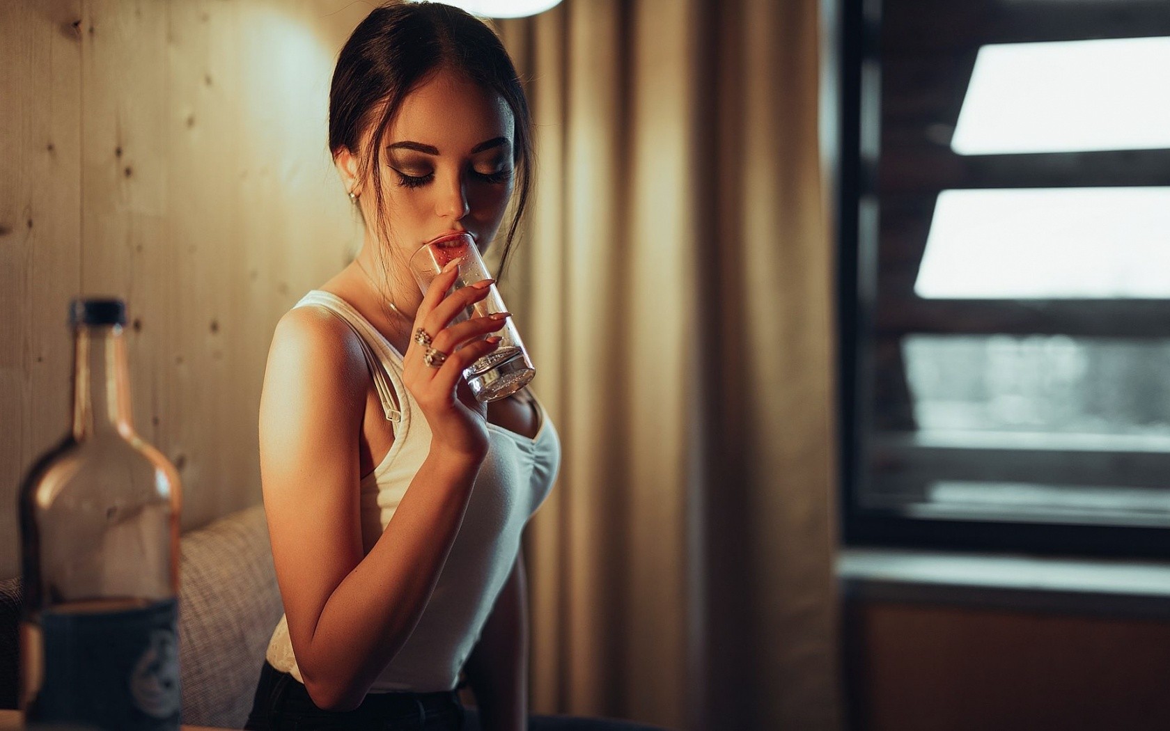 Woman drinking from a glass HD Wallpaper