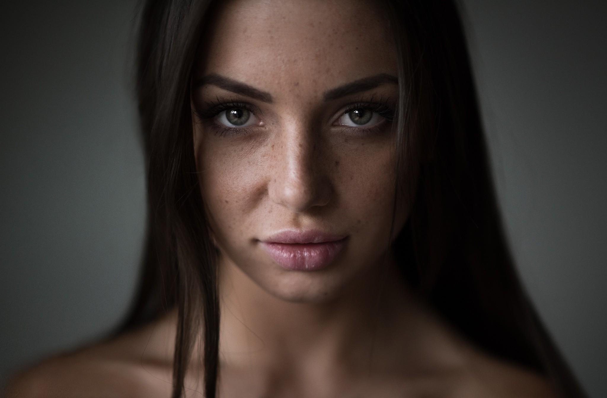 Portrait of a woman with freckles by Andrew Phirsov HD Wallpaper