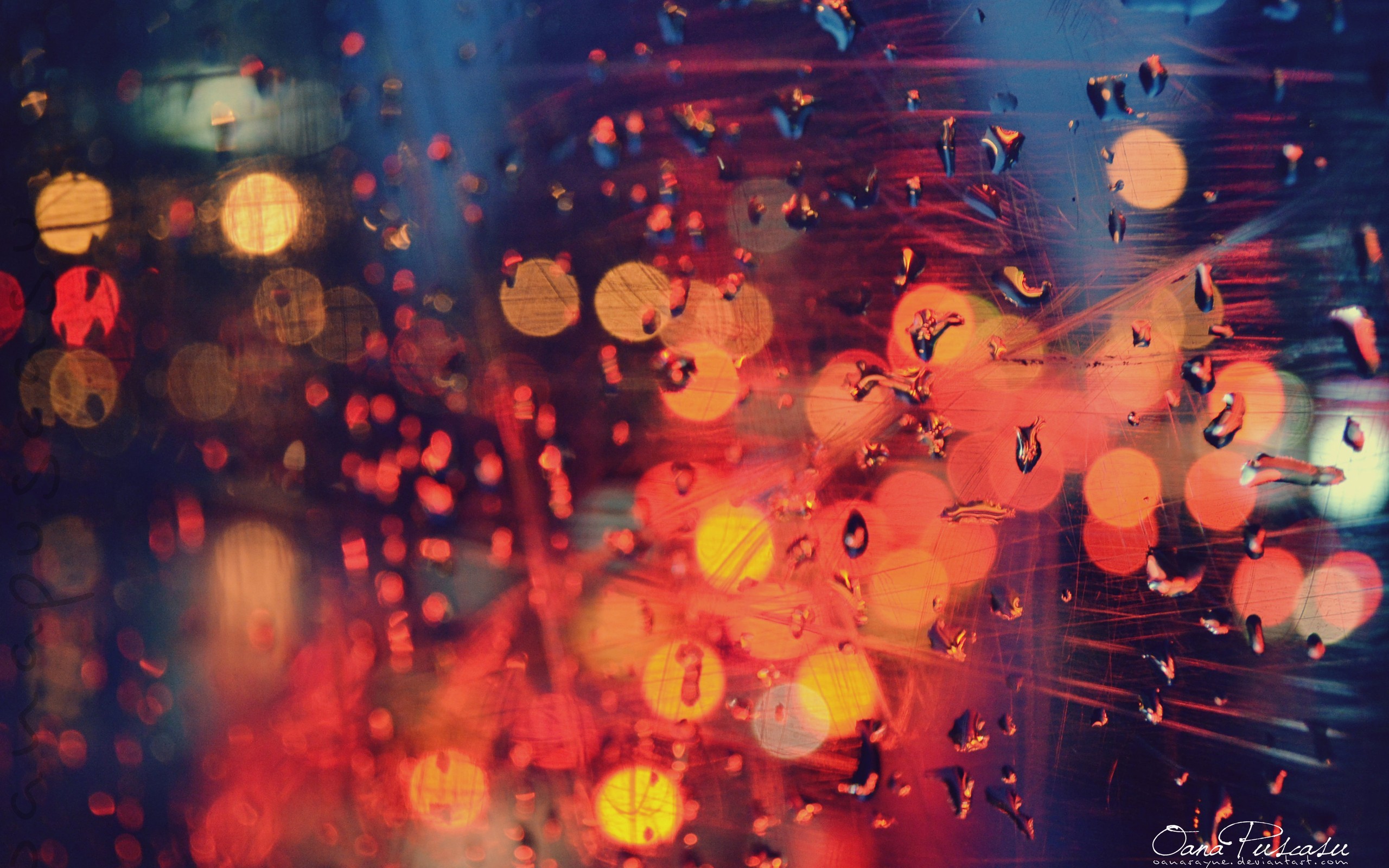 Water drops on glass with bokeh lights HD Wallpaper