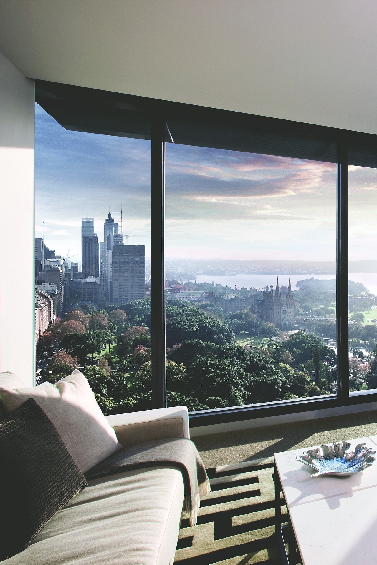 Sydney cityscape viewed from a modern apartment interior HD Wallpaper