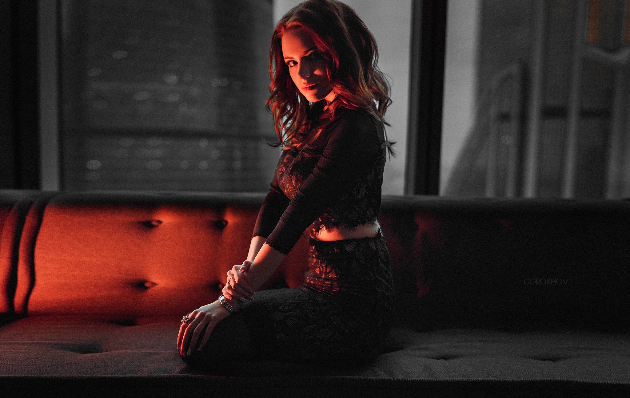 Woman kneeling on a couch by Ivan Gorokhov HD Wallpaper
