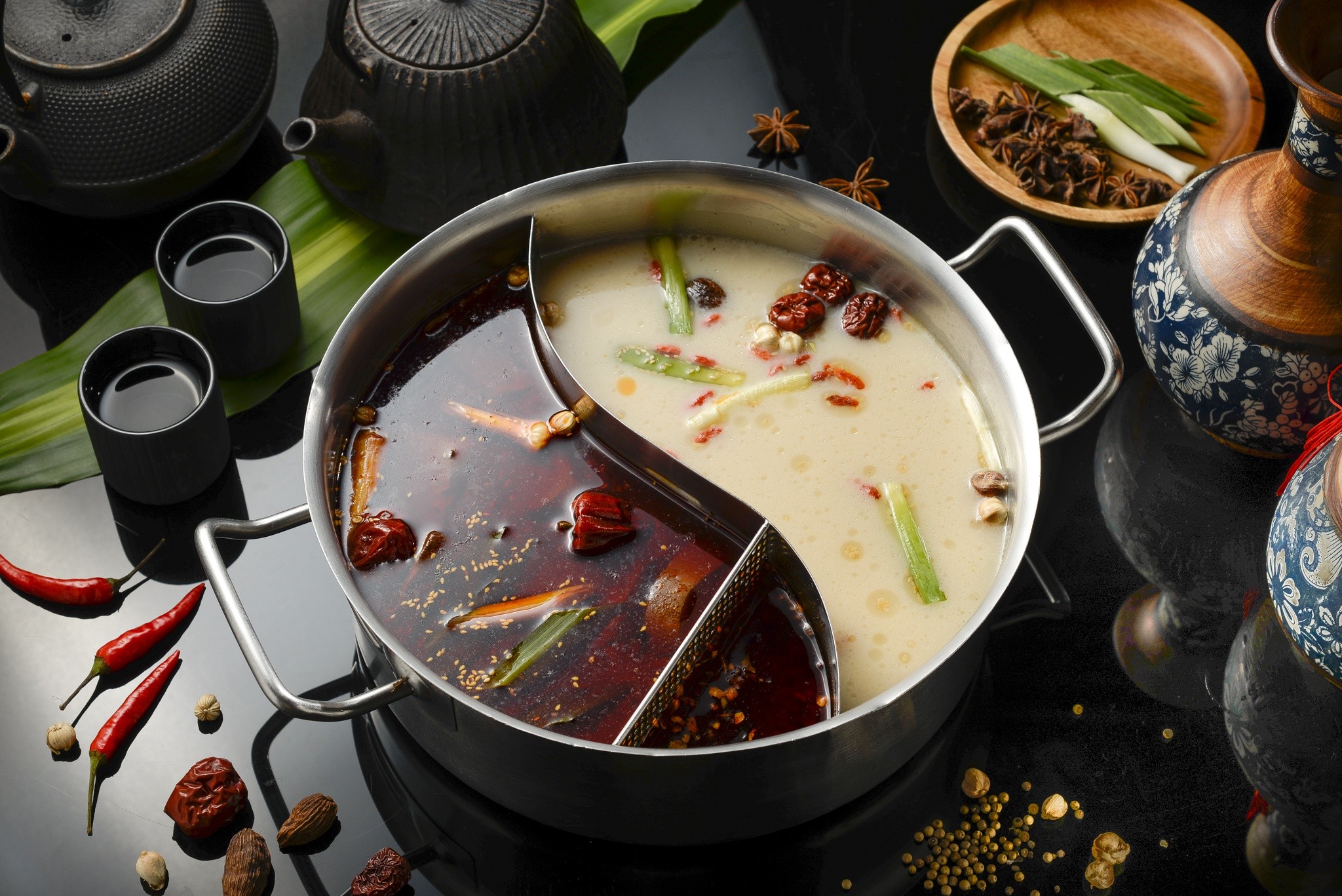 Yin Yang Hot Pot with Ingredients HD Wallpaper