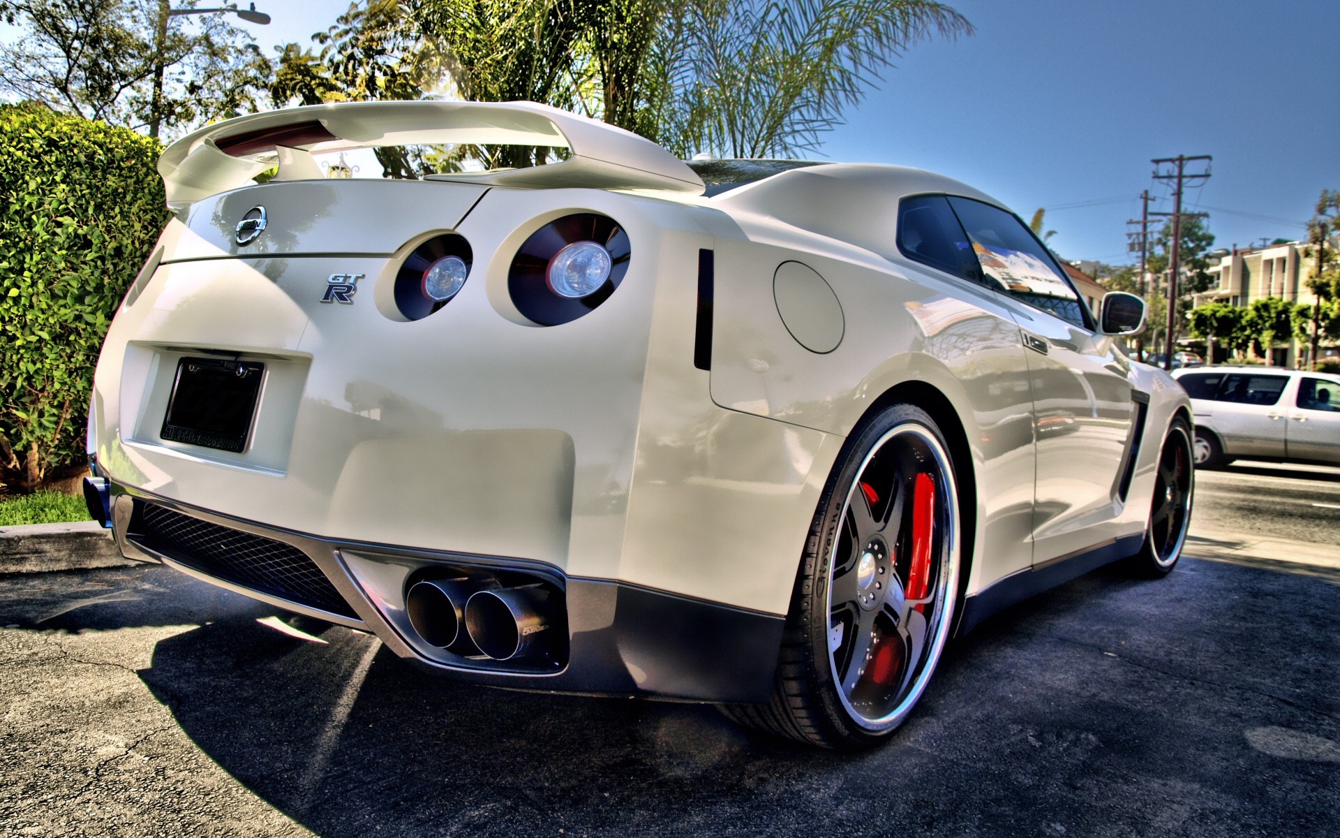 White Nissan Skyline GT-R R35 parked outdoors HD Wallpaper
