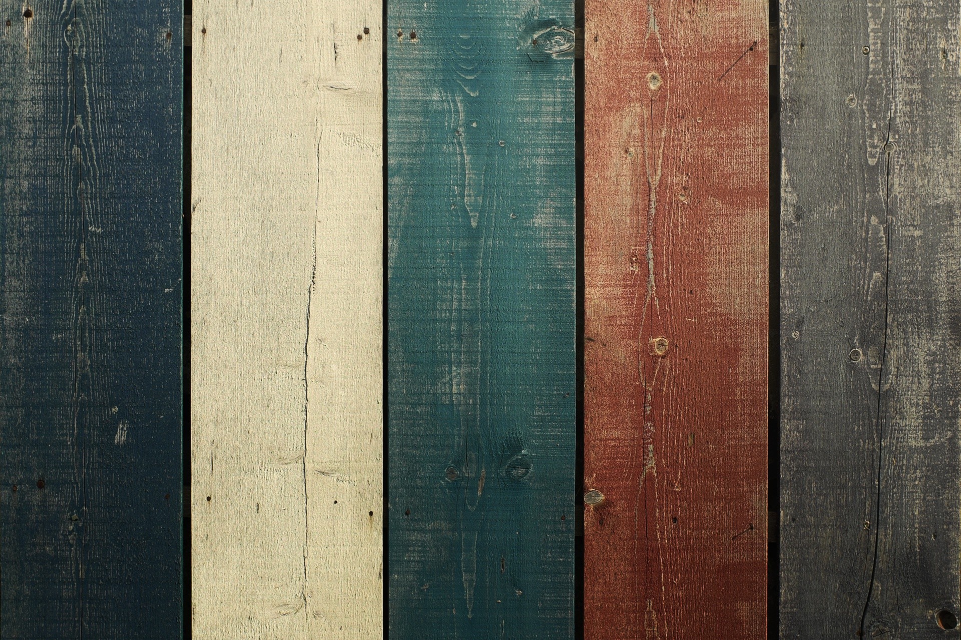 Weathered wooden planks in blue, white, teal, red, and gray HD Wallpaper