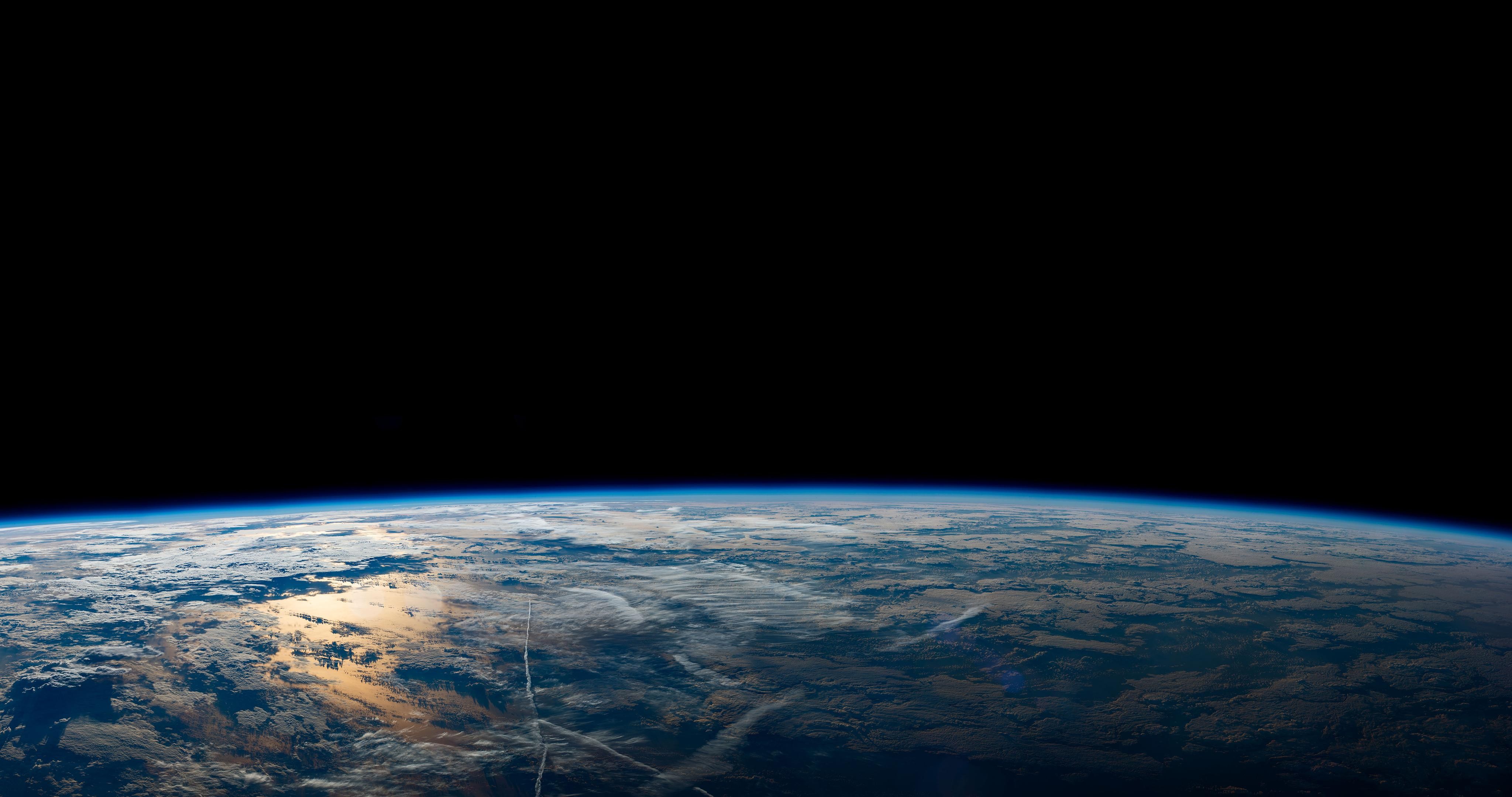 Earth from space with clouds and ocean HD Wallpaper