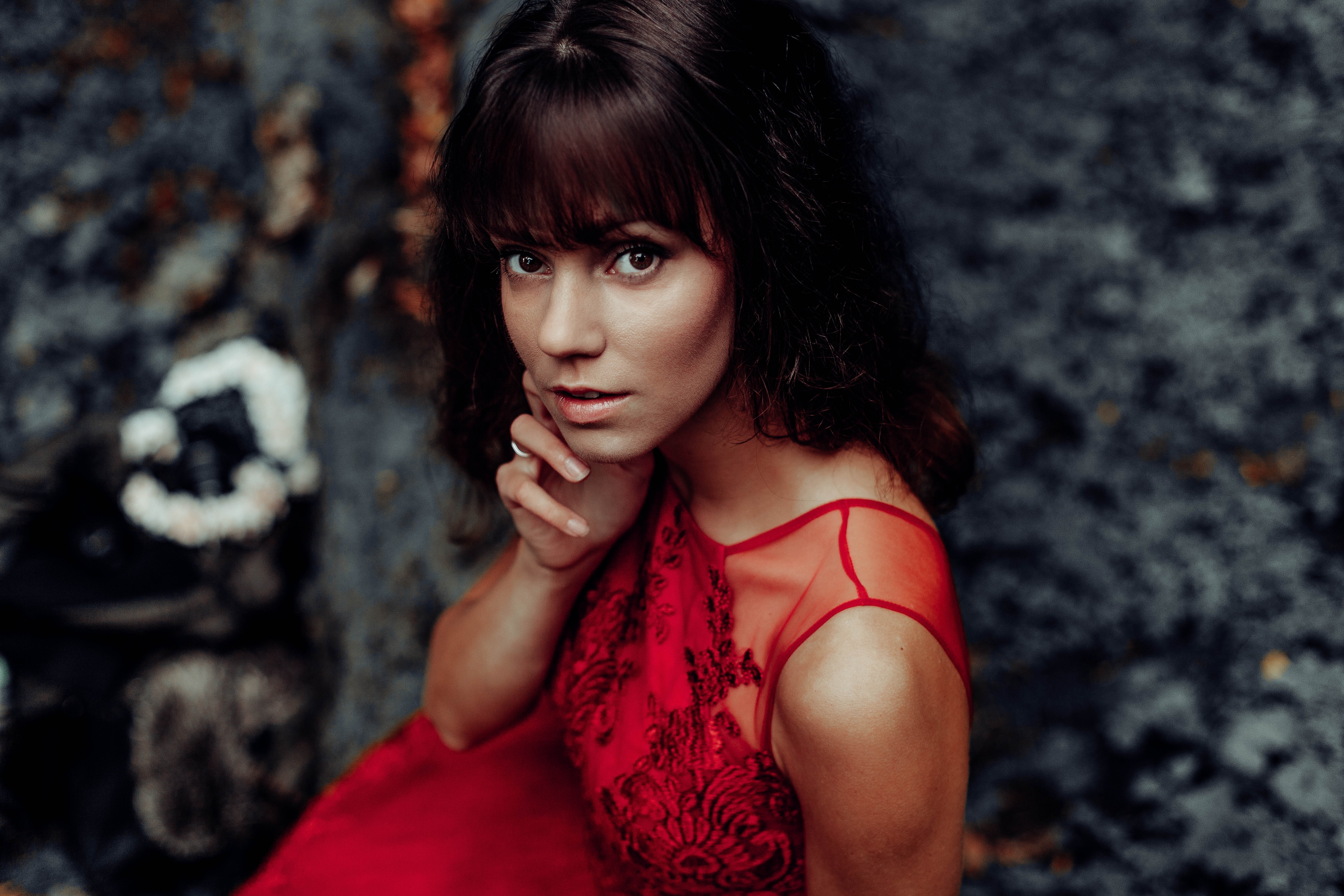 Woman in red dress looking at viewer HD Wallpaper