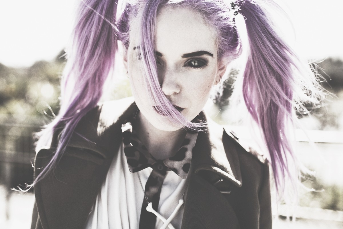 Woman with purple pigtails and dark makeup HD Wallpaper
