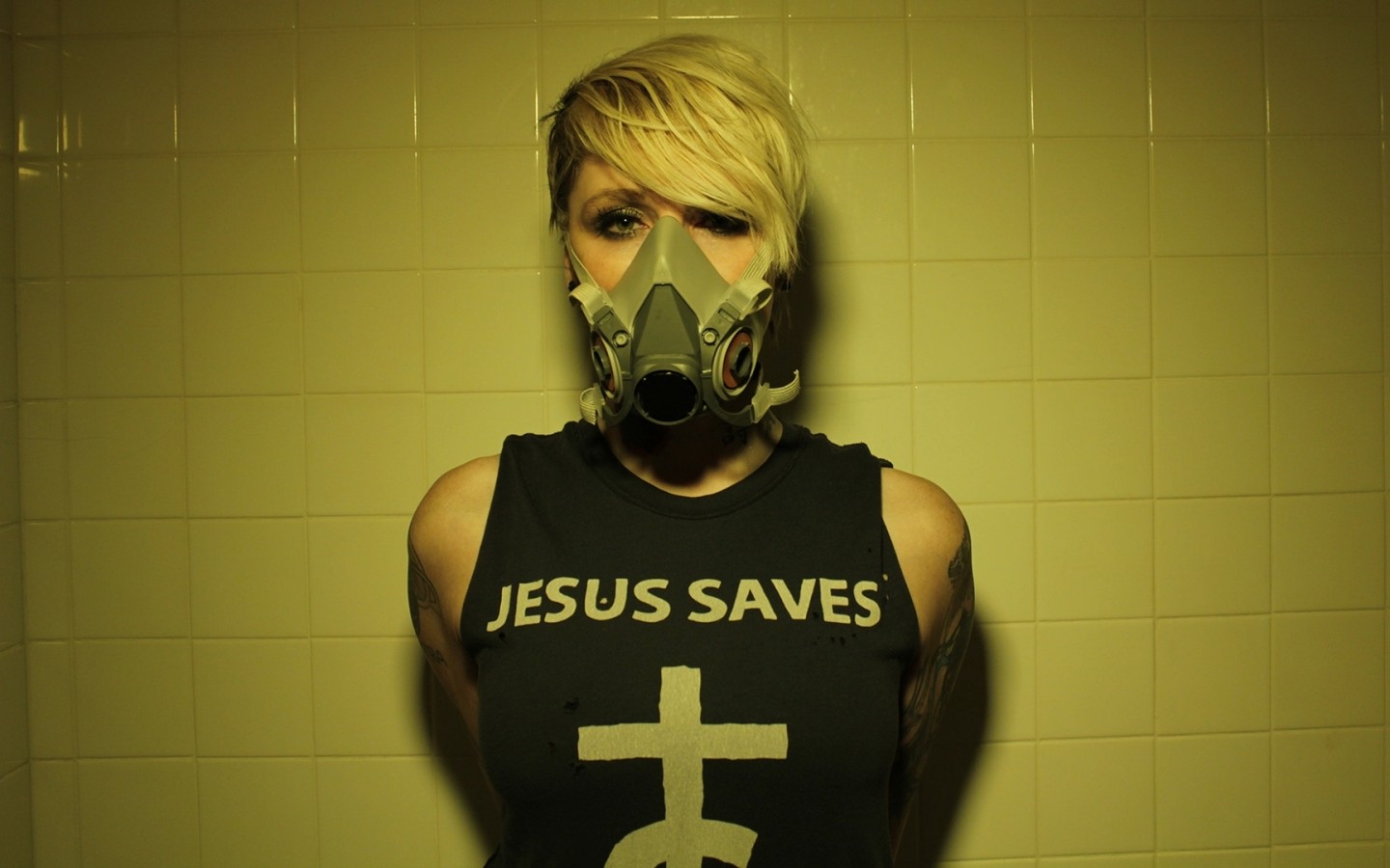 Otep wearing a gas mask and a "Jesus Saves" shirt HD Wallpaper