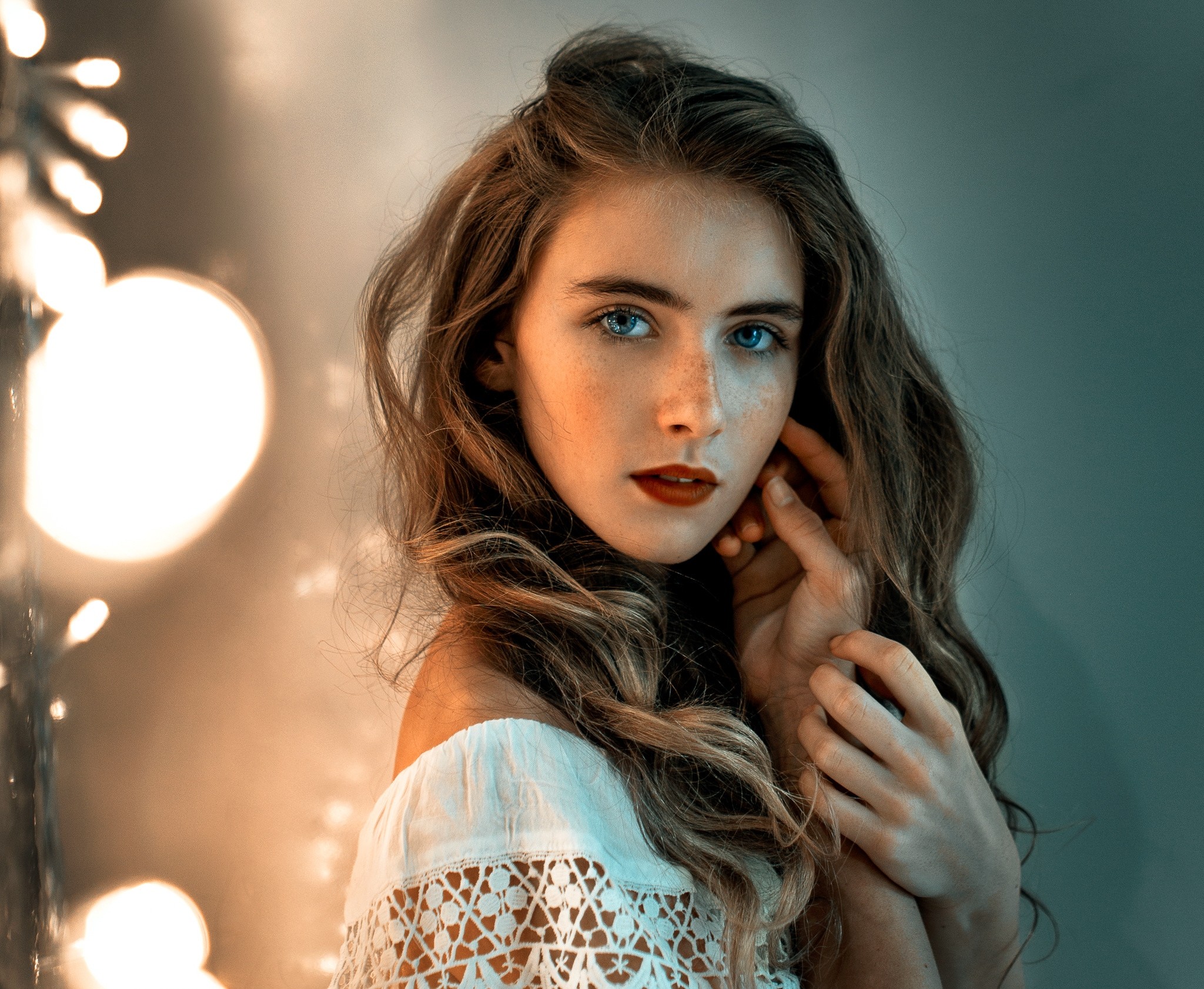 Portrait of a woman with blue eyes and freckles HD Wallpaper