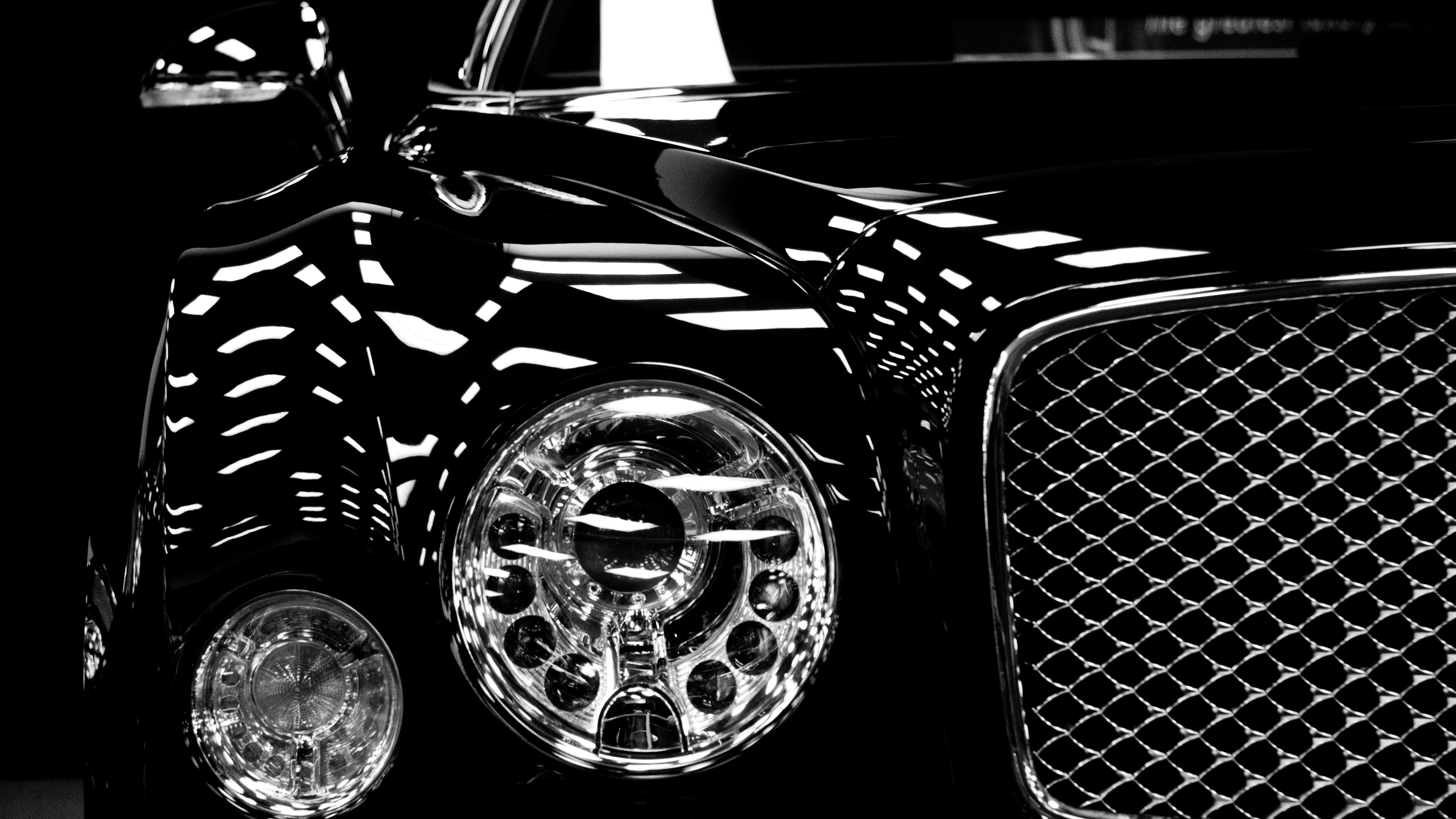 Monochrome close-up of a black Bentley car HD Wallpaper