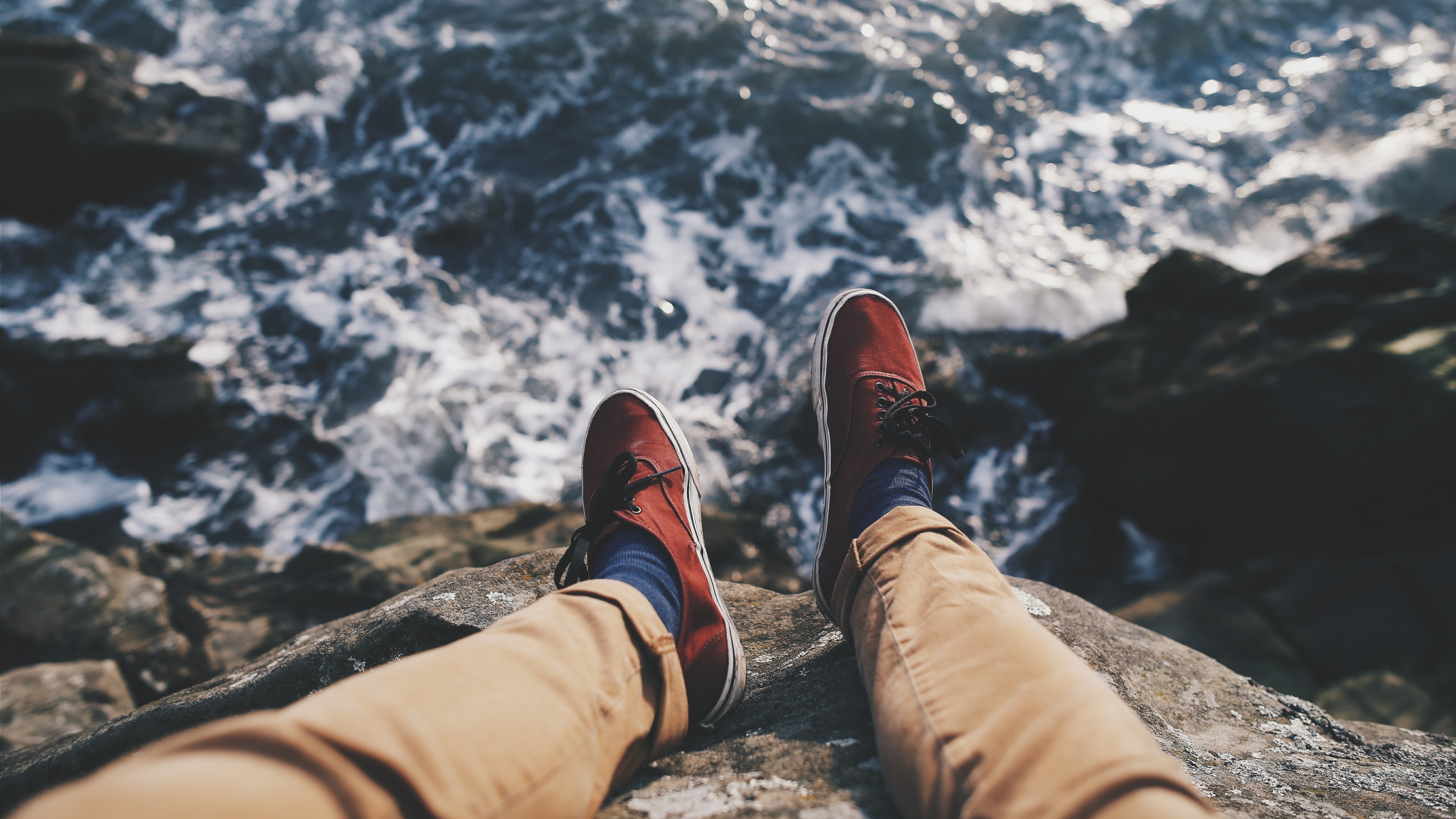 Person's legs and feet by the sea HD Wallpaper