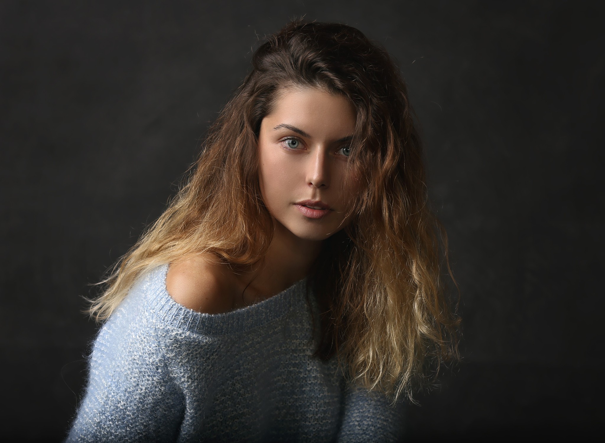 Portrait of a woman with blue eyes wearing a sweater HD Wallpaper
