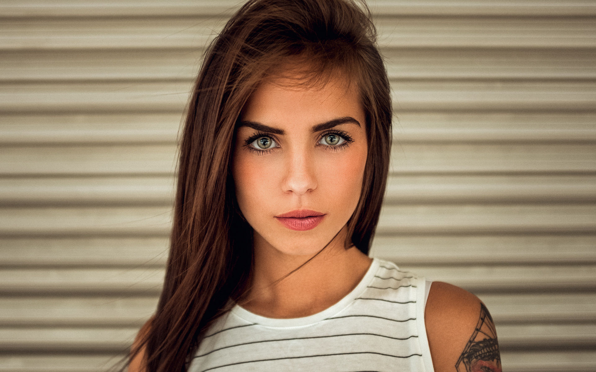 Woman with green eyes and tattoo HD Wallpaper