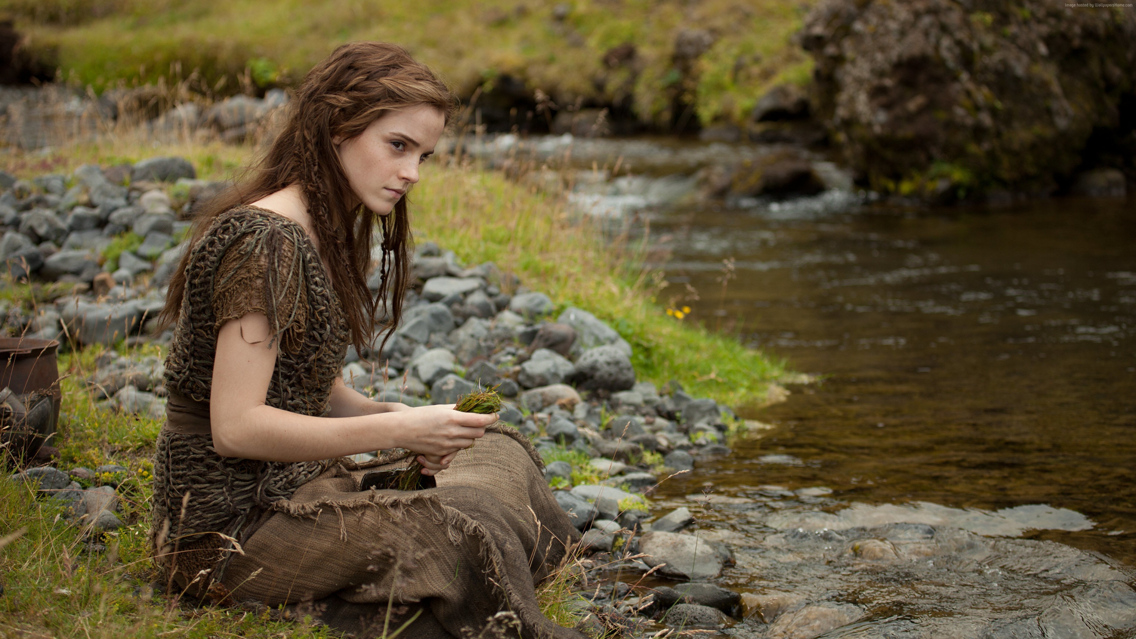 Emma Watson sitting by a stream HD Wallpaper