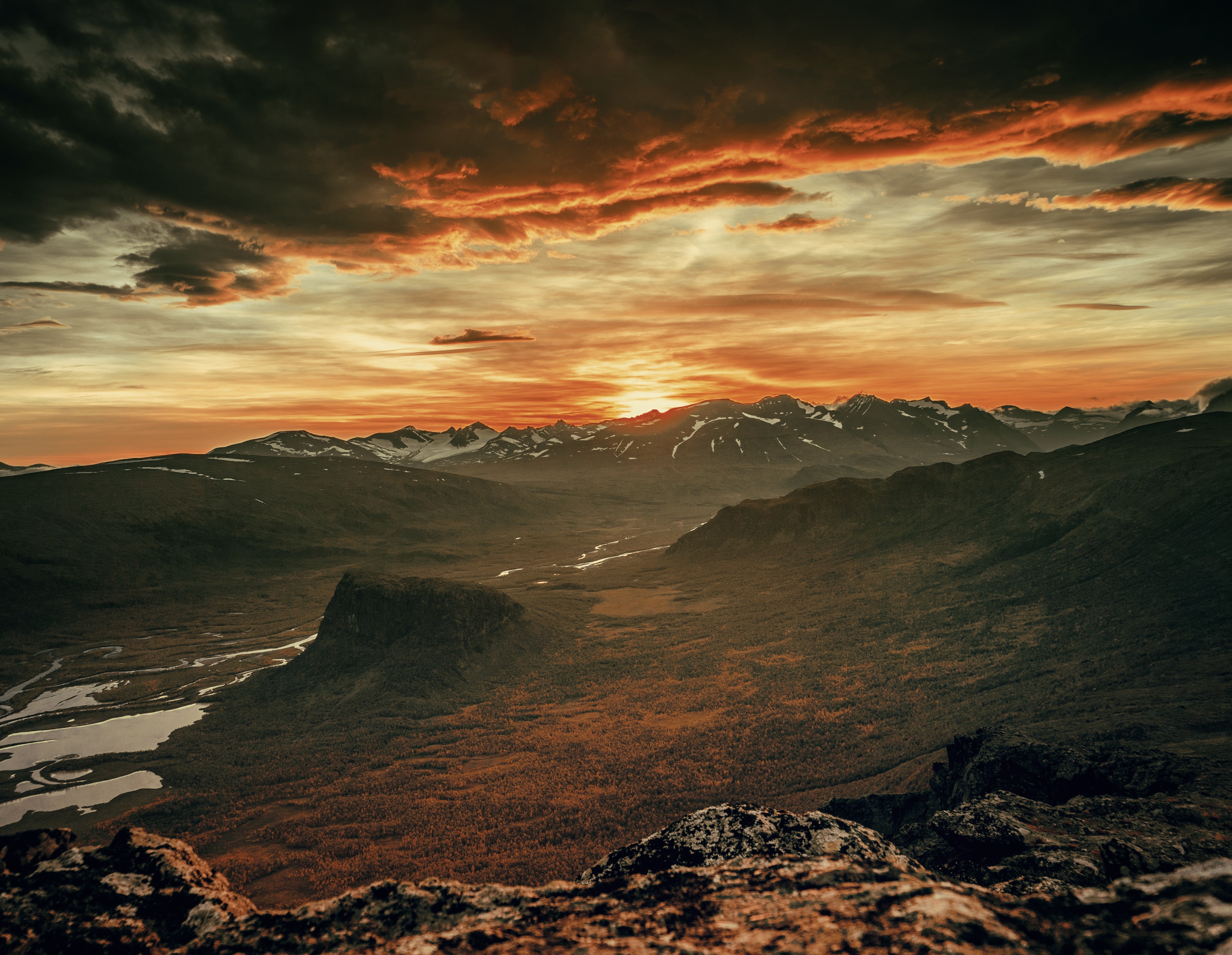 Sunset over a vast mountain valley with a river HD Wallpaper