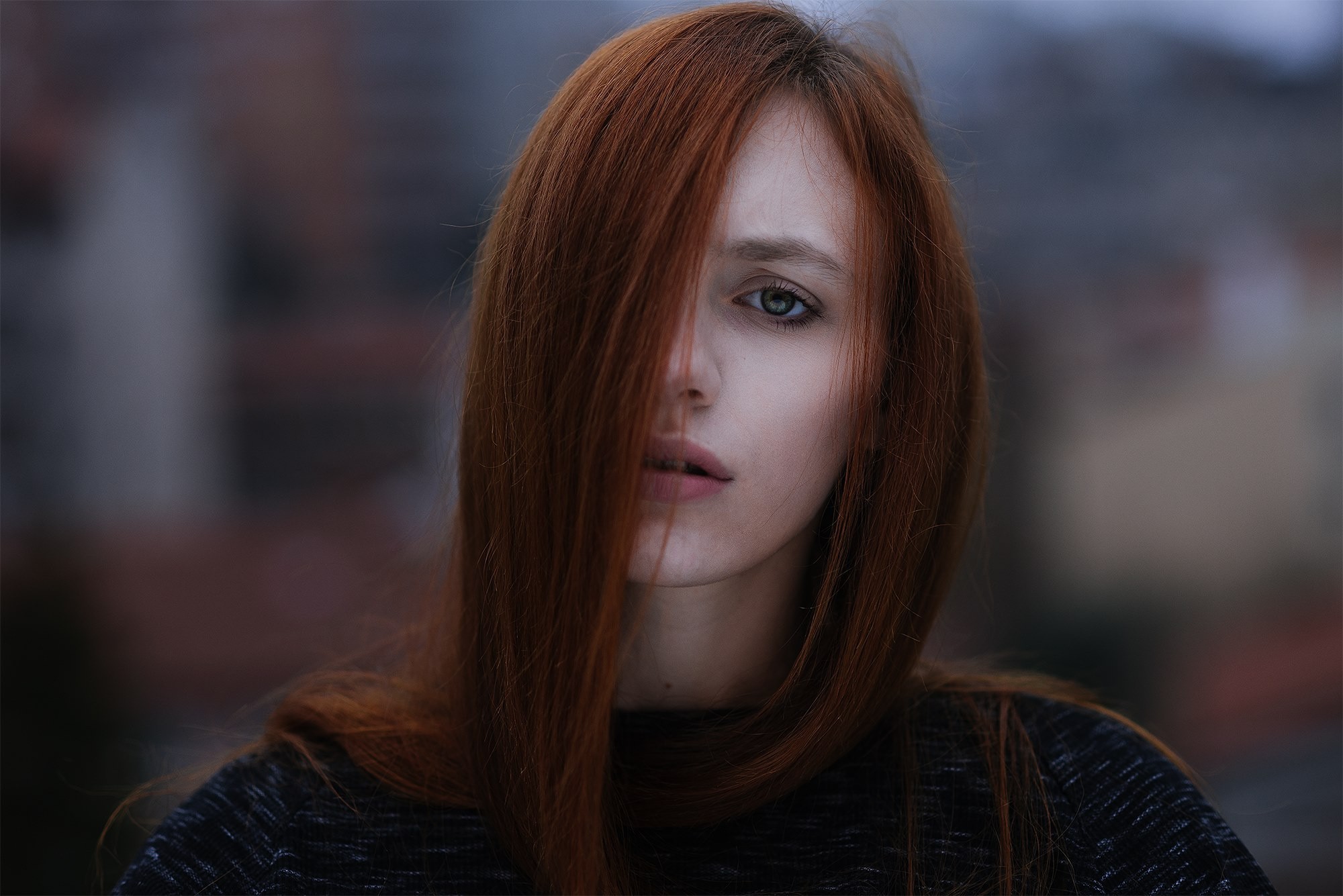 Portrait of a redhead woman with hair in her face HD Wallpaper