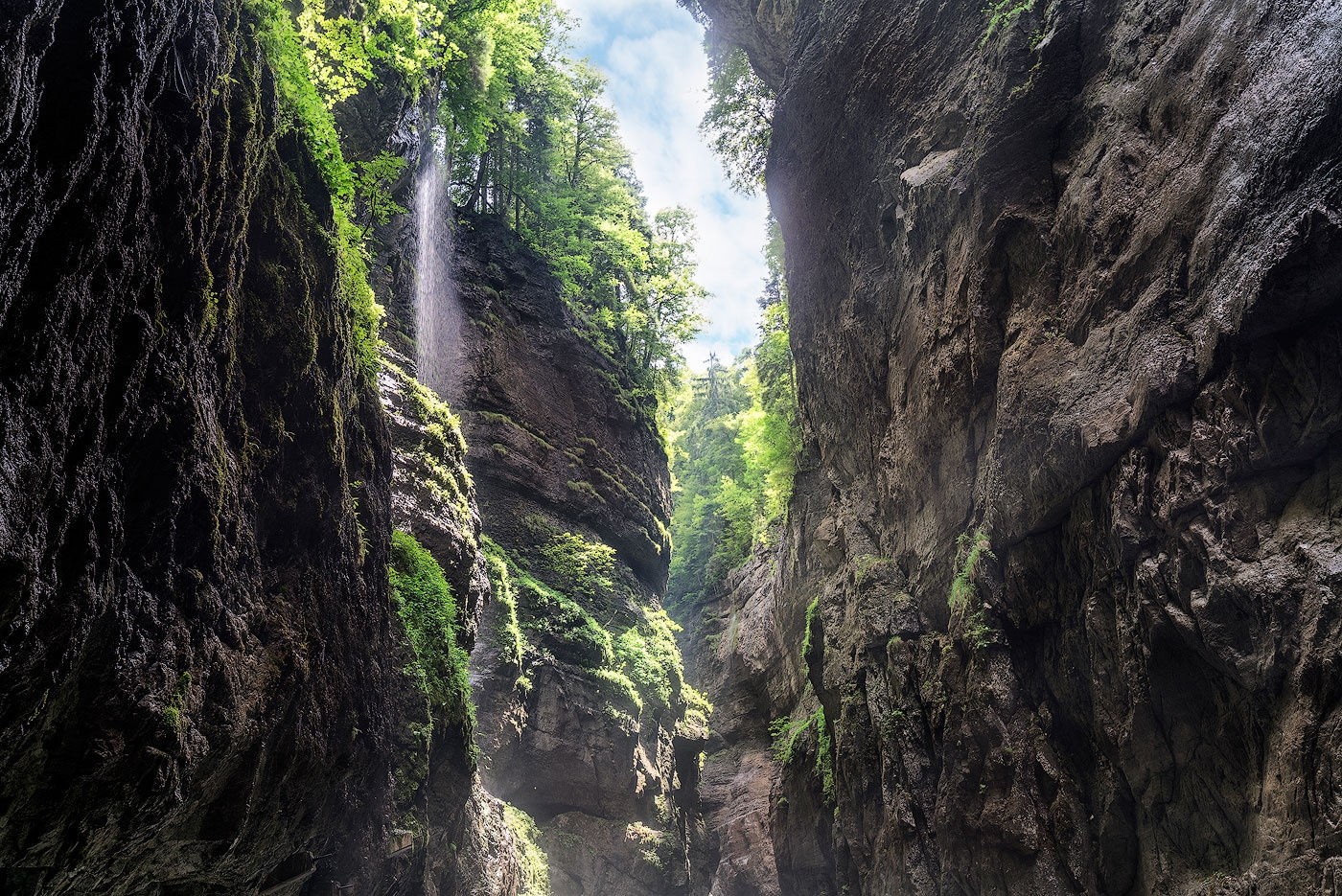 Waterfall cascading down a rocky canyon in Germany HD Wallpaper