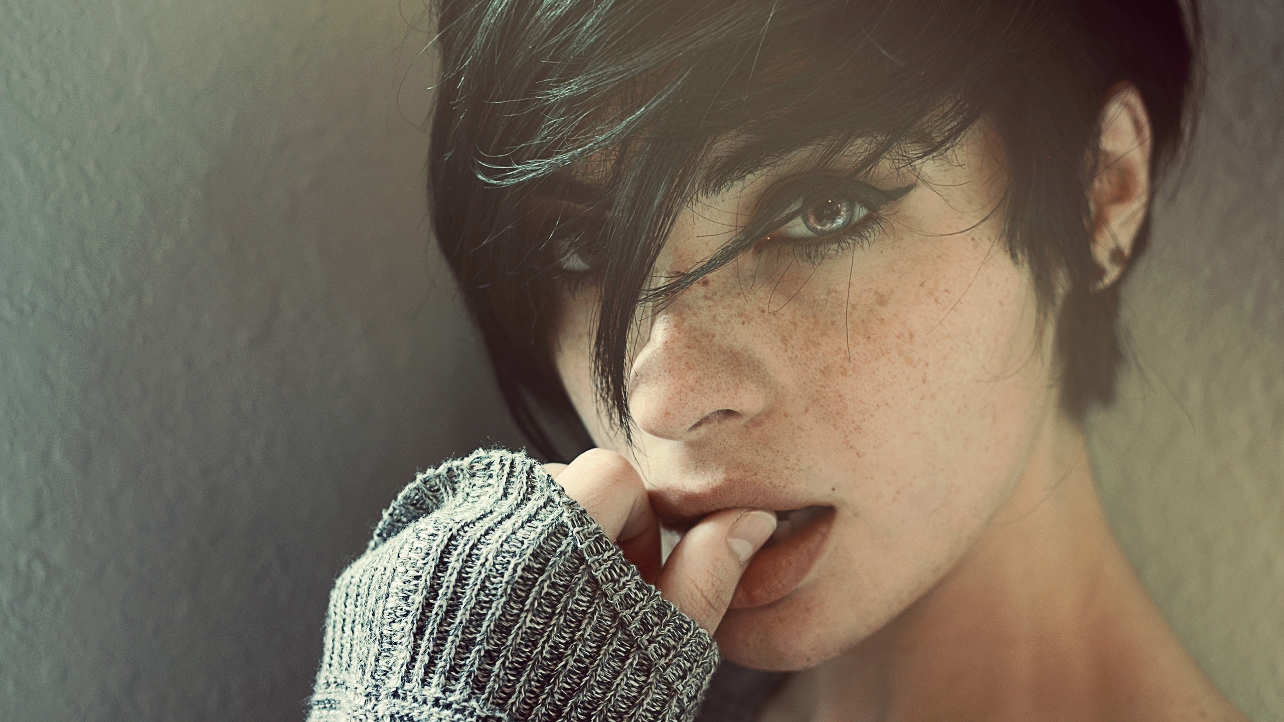 Woman with short dark hair and freckles HD Wallpaper