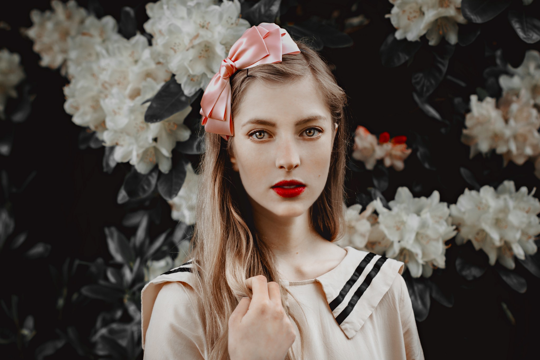 Woman with pink hair bow and red lipstick HD Wallpaper
