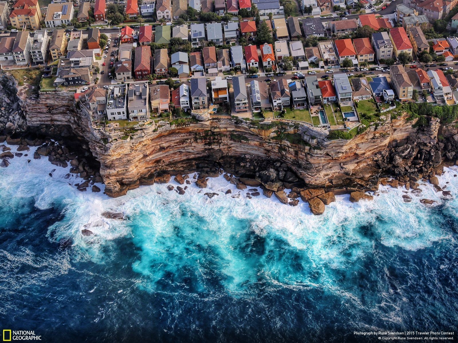 Coastal Cliffside Homes Overlooking the Ocean HD Wallpaper