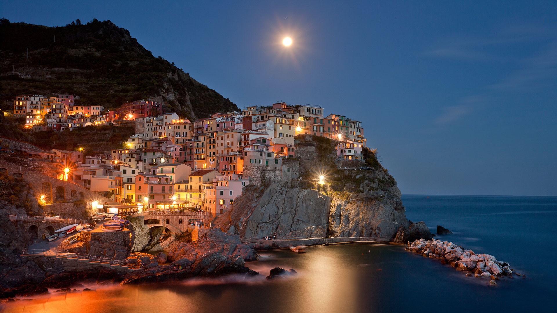 Manarola village at night with moon HD Wallpaper