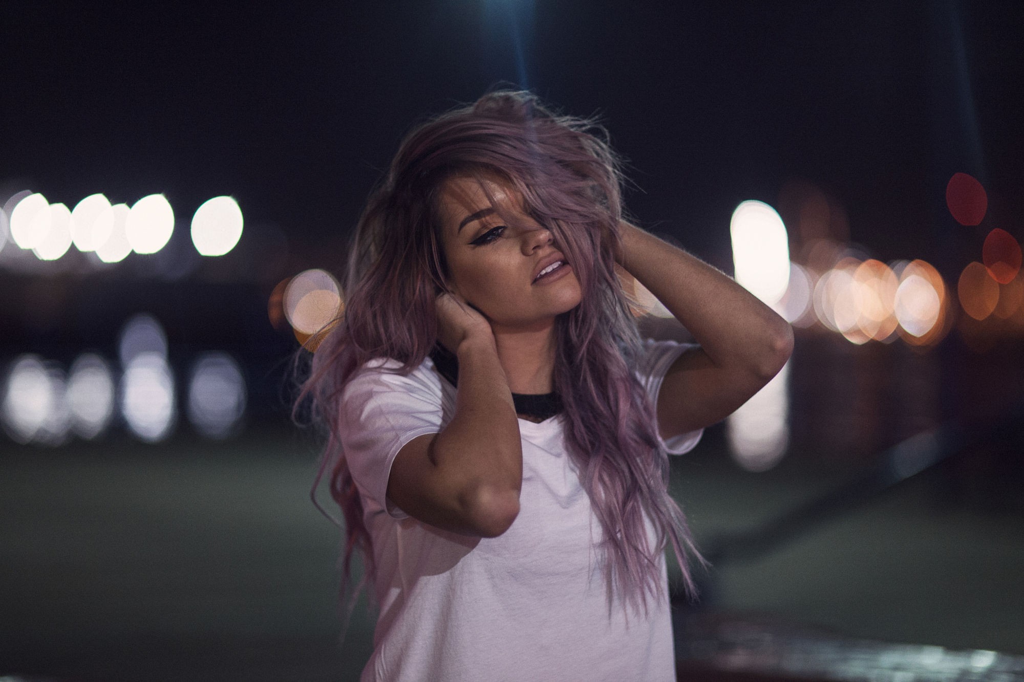 Woman with purple hair at night with bokeh lights HD Wallpaper