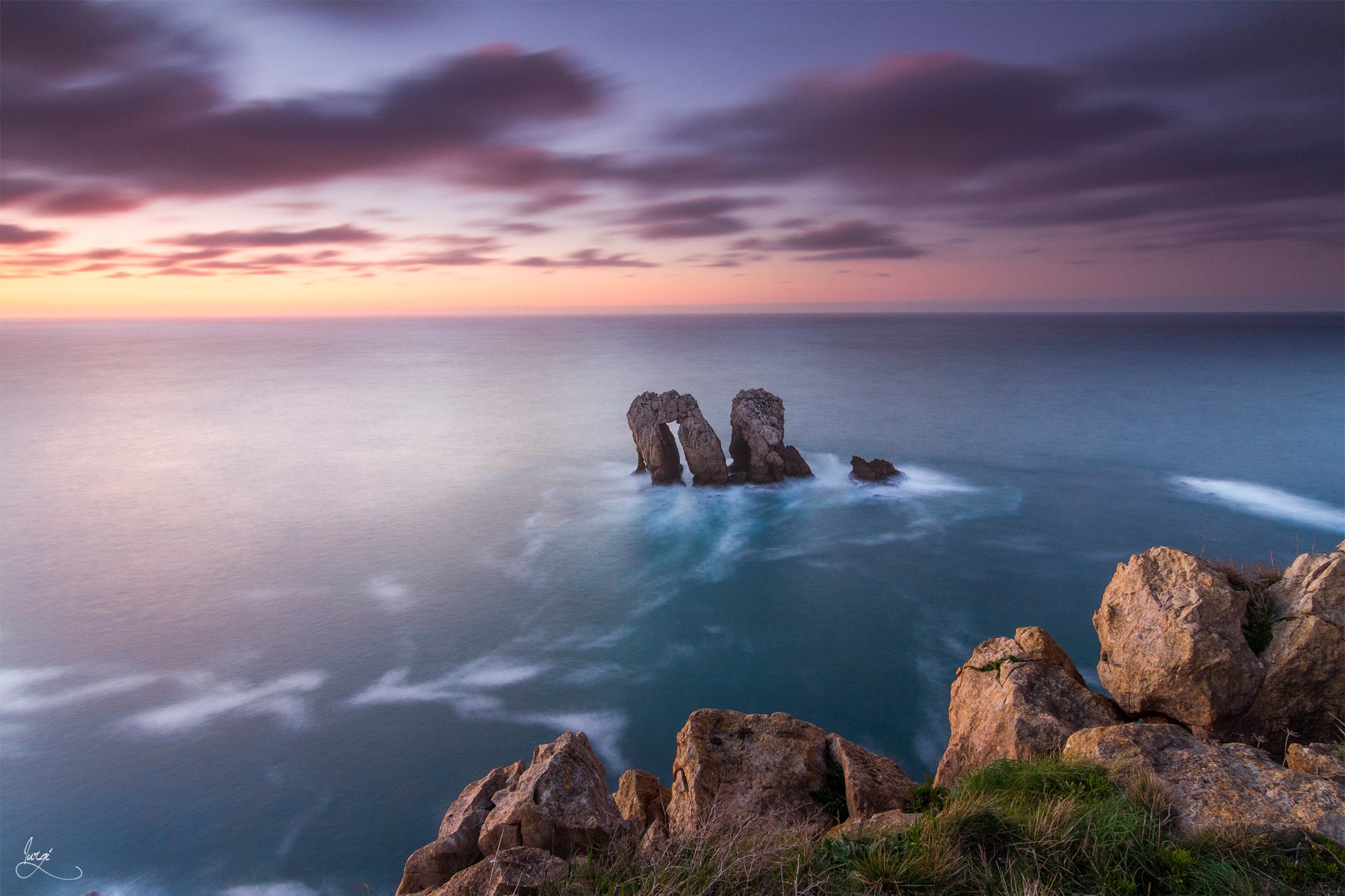 Sea stacks at sunset with dramatic clouds HD Wallpaper