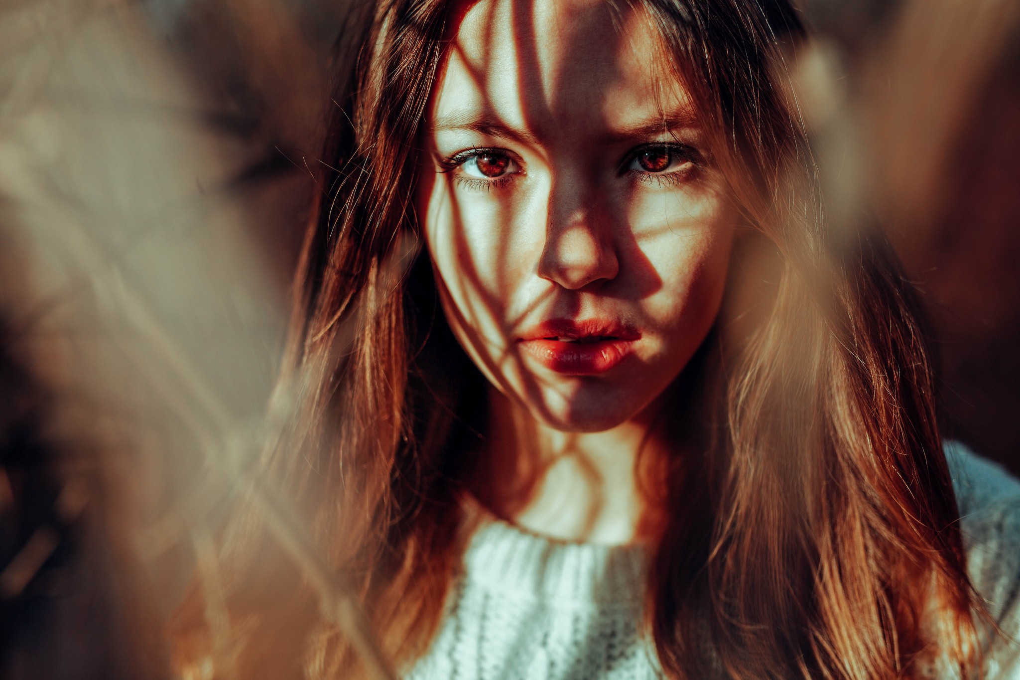 Woman with red lipstick and shadows on her face HD Wallpaper