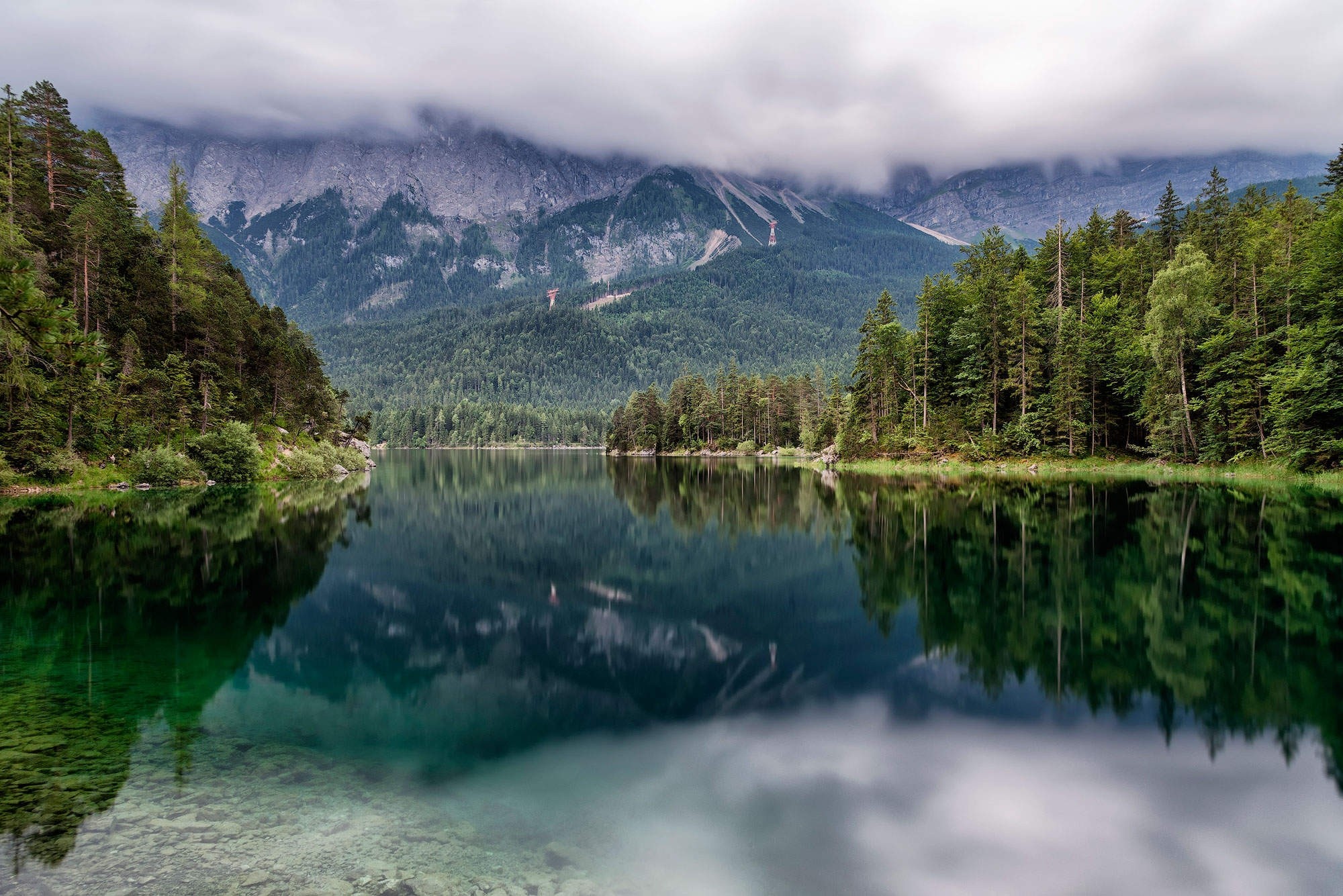Lake Eibsee with Zugspitze mountains in Germany HD Wallpaper