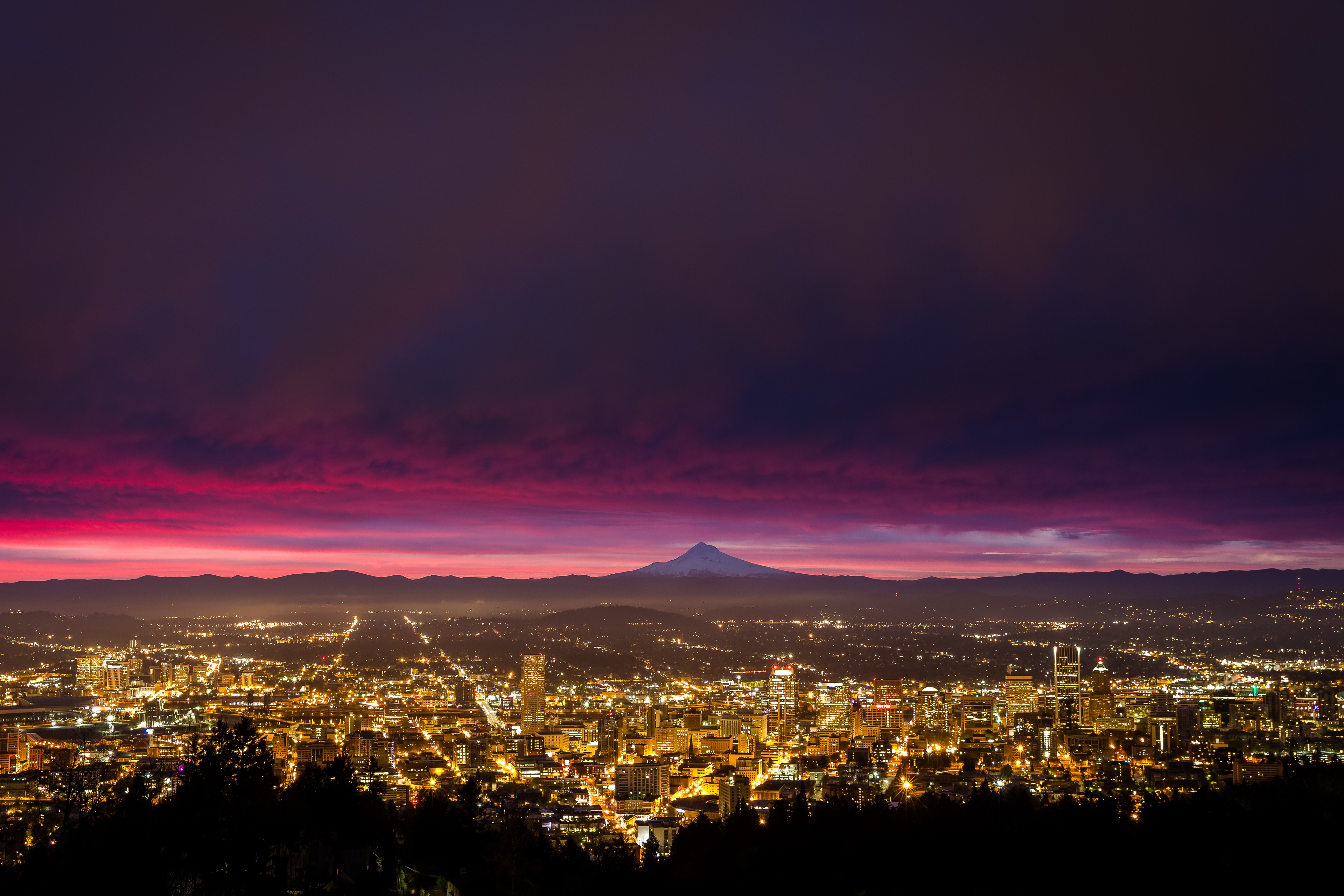 Cityscape at dusk with Mount Hood in the distance HD Wallpaper