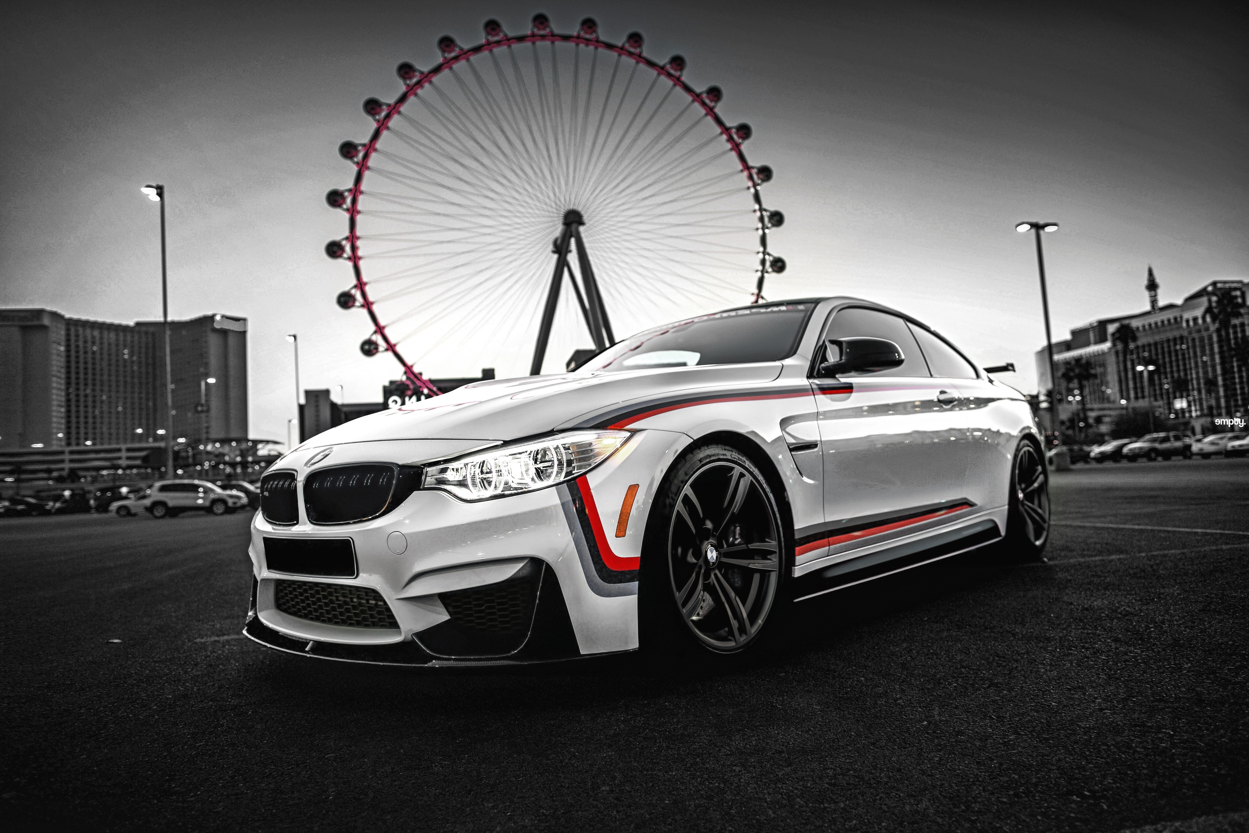 White BMW M4 in front of a Ferris wheel HD Wallpaper