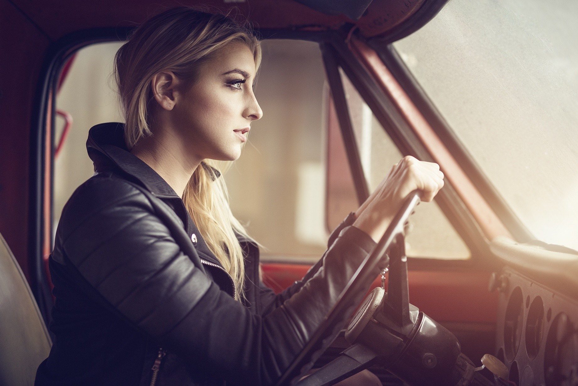 Woman driving a red car HD Wallpaper