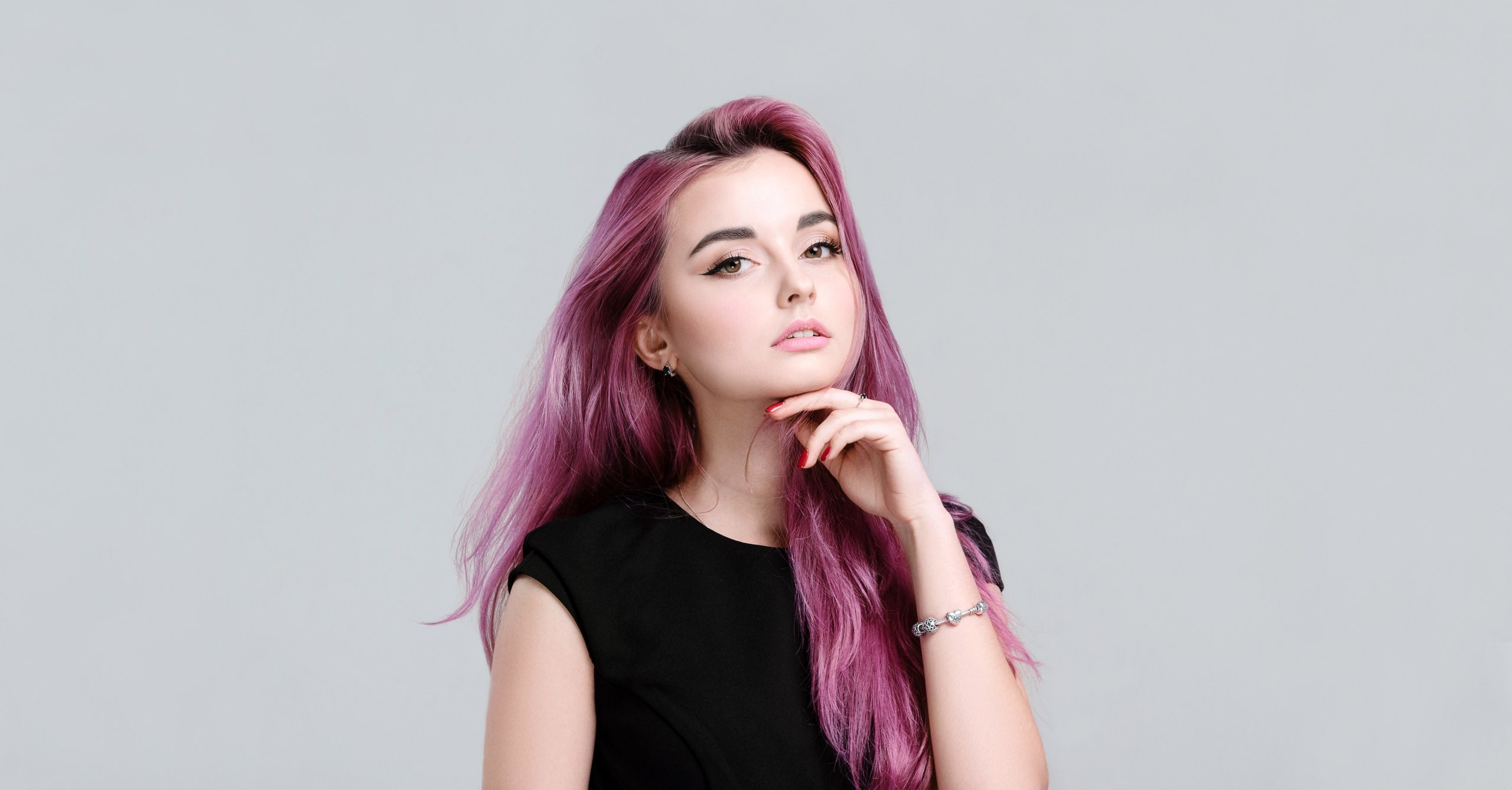 Woman with pink dyed hair in a black dress HD Wallpaper